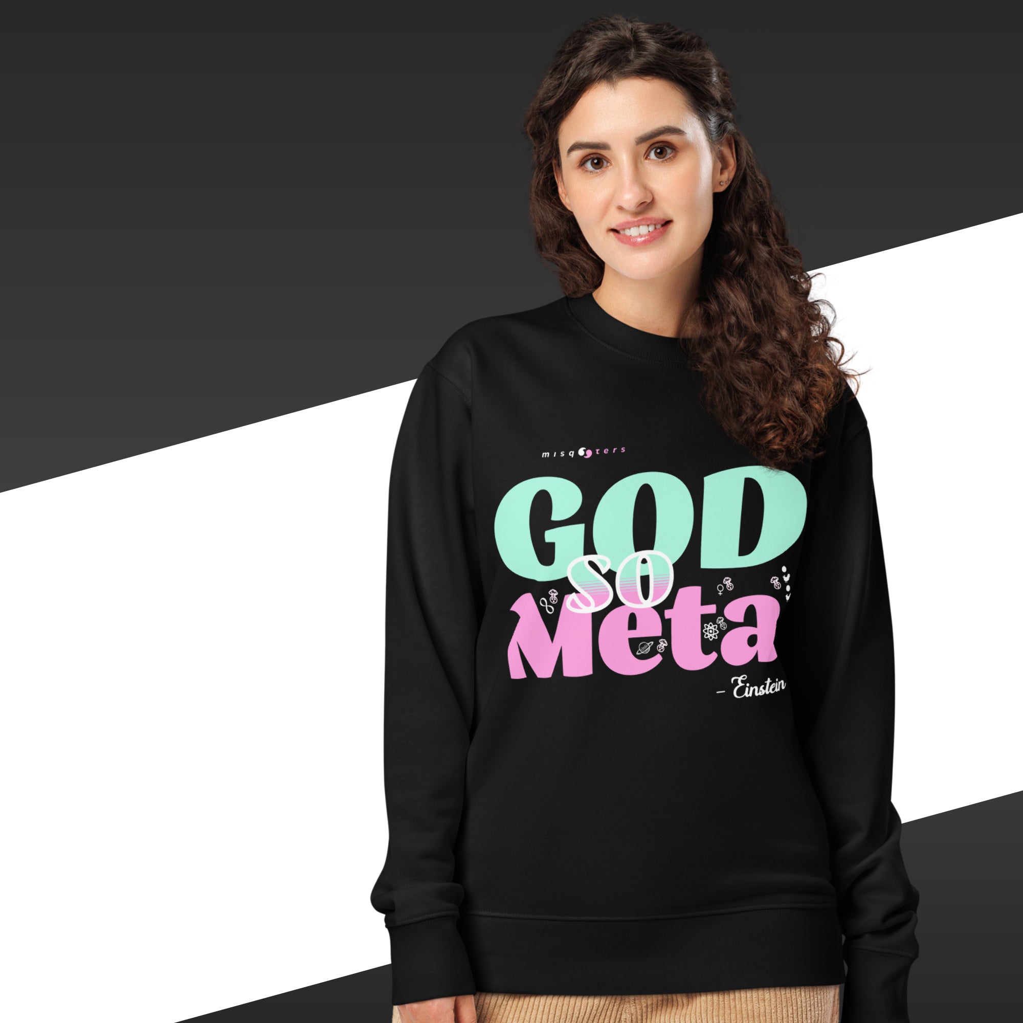 Woman wearing a black sweatshirt with colorful text on a black and white background