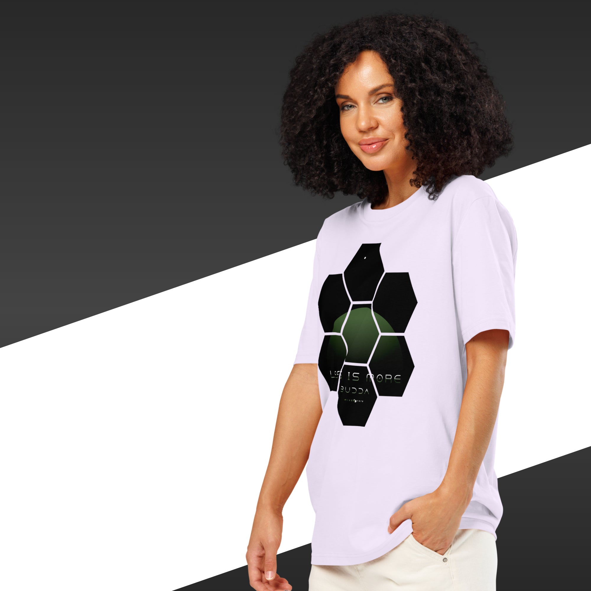 Woman wearing a white t-shirt with a black geometric design on a black and white background