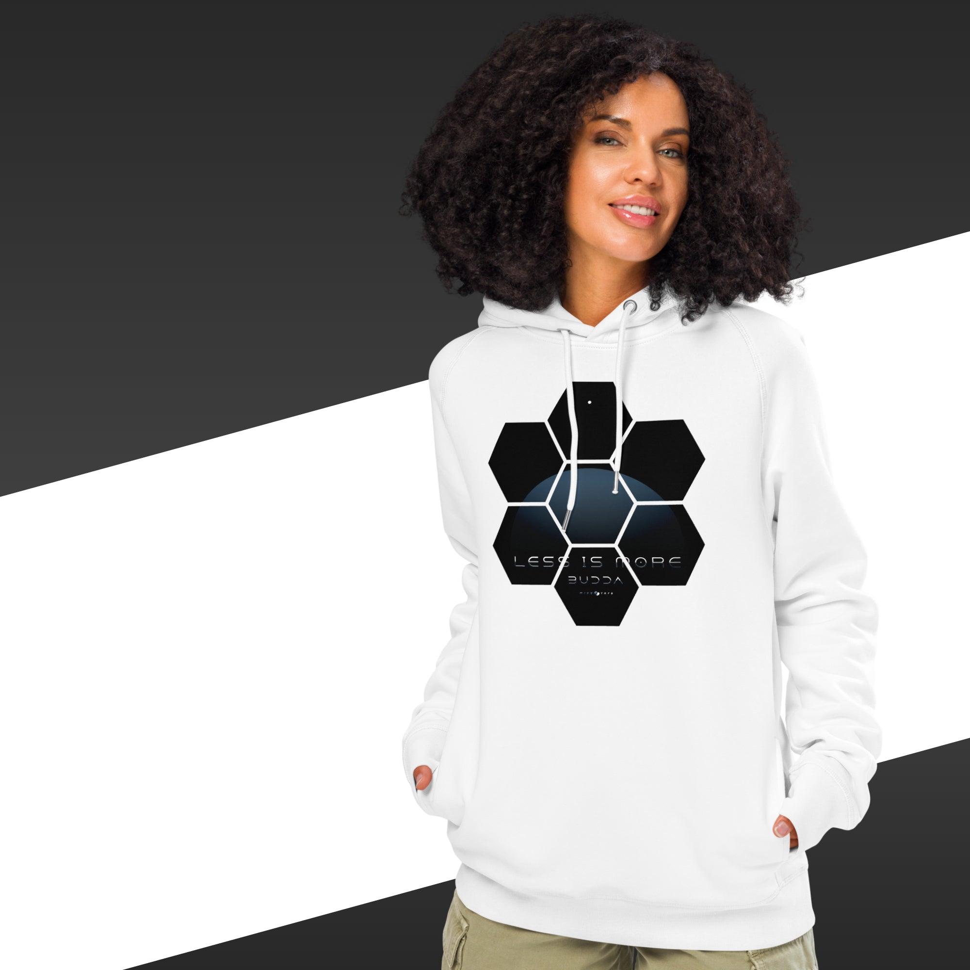 Woman with a white hoodie with a geometrical design and the quote "less is more" from Buddha