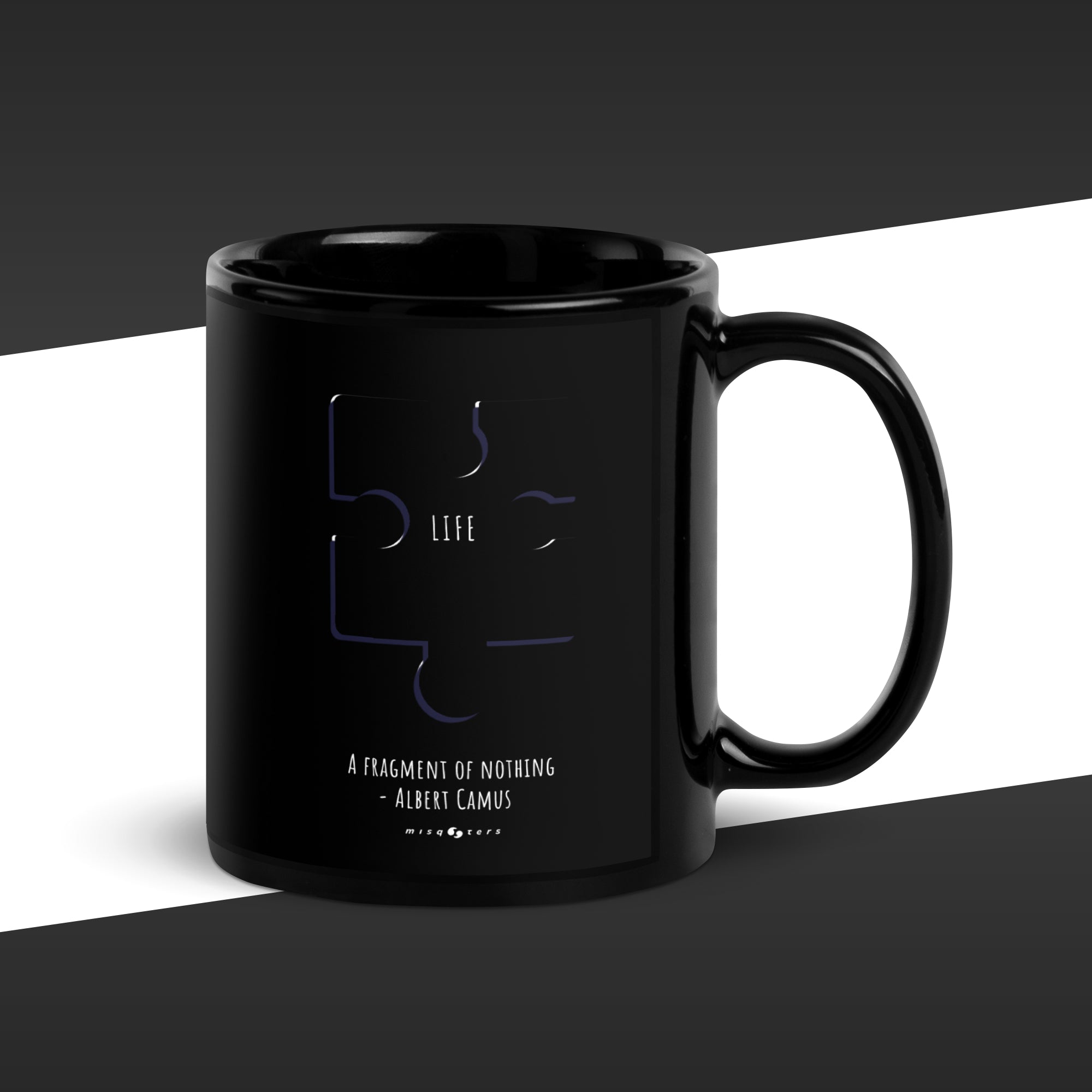 Black mug with a quote by Albert Camus on a black and white background