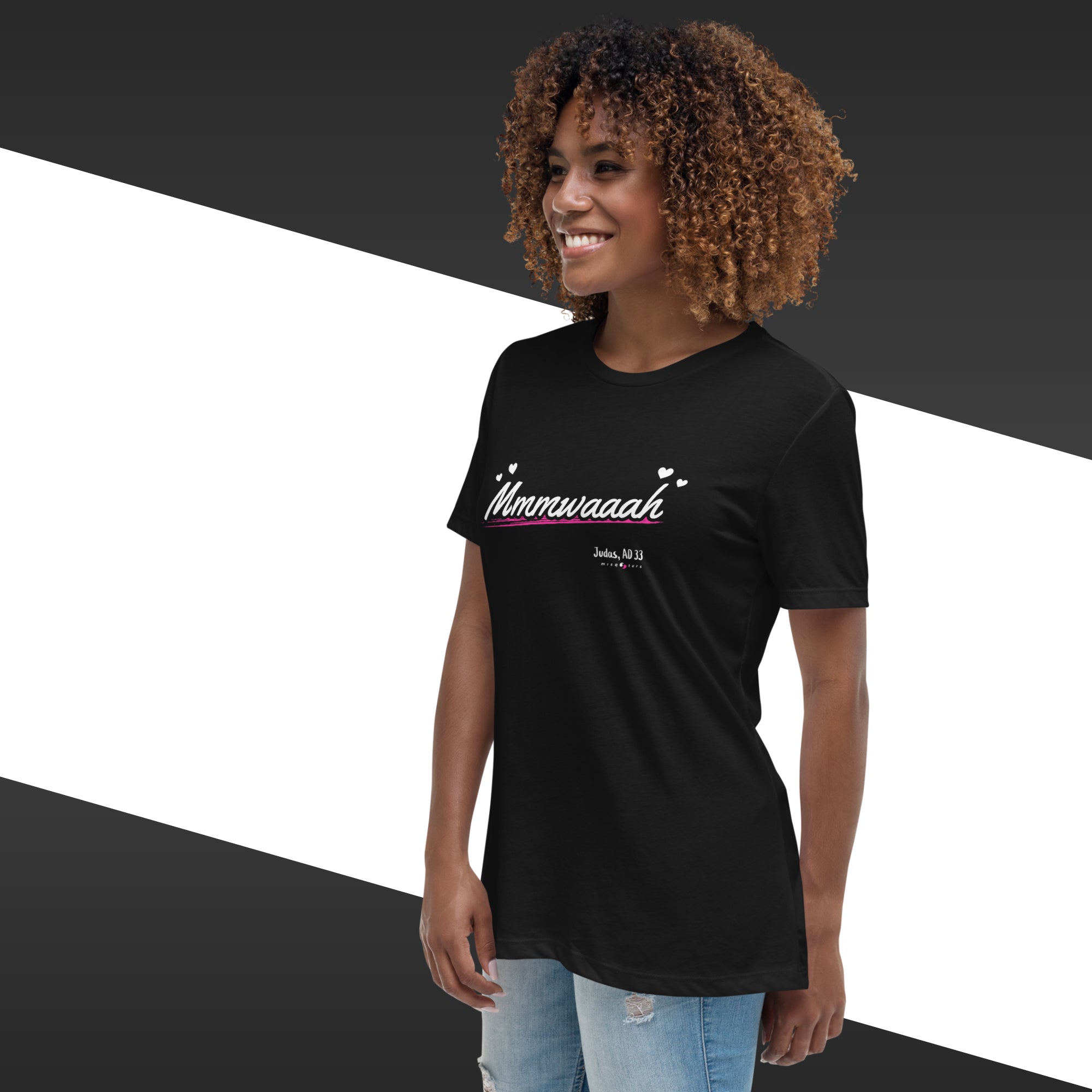 Woman wearing a black t-shirt with text on a geometric background