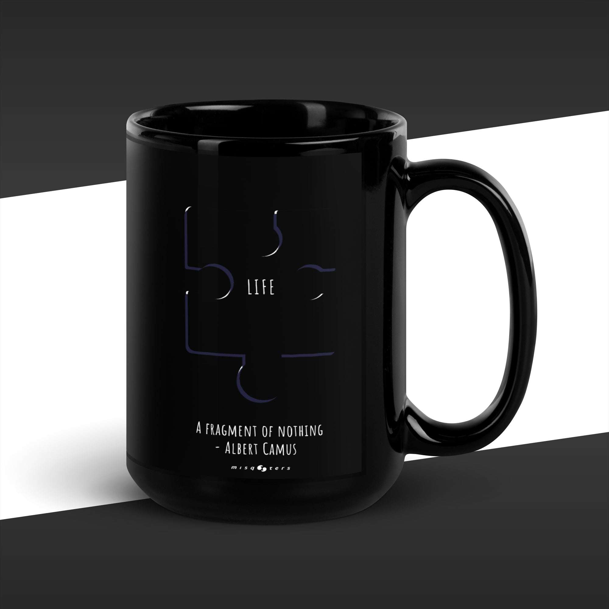 Black mug with a design and text on a dark background