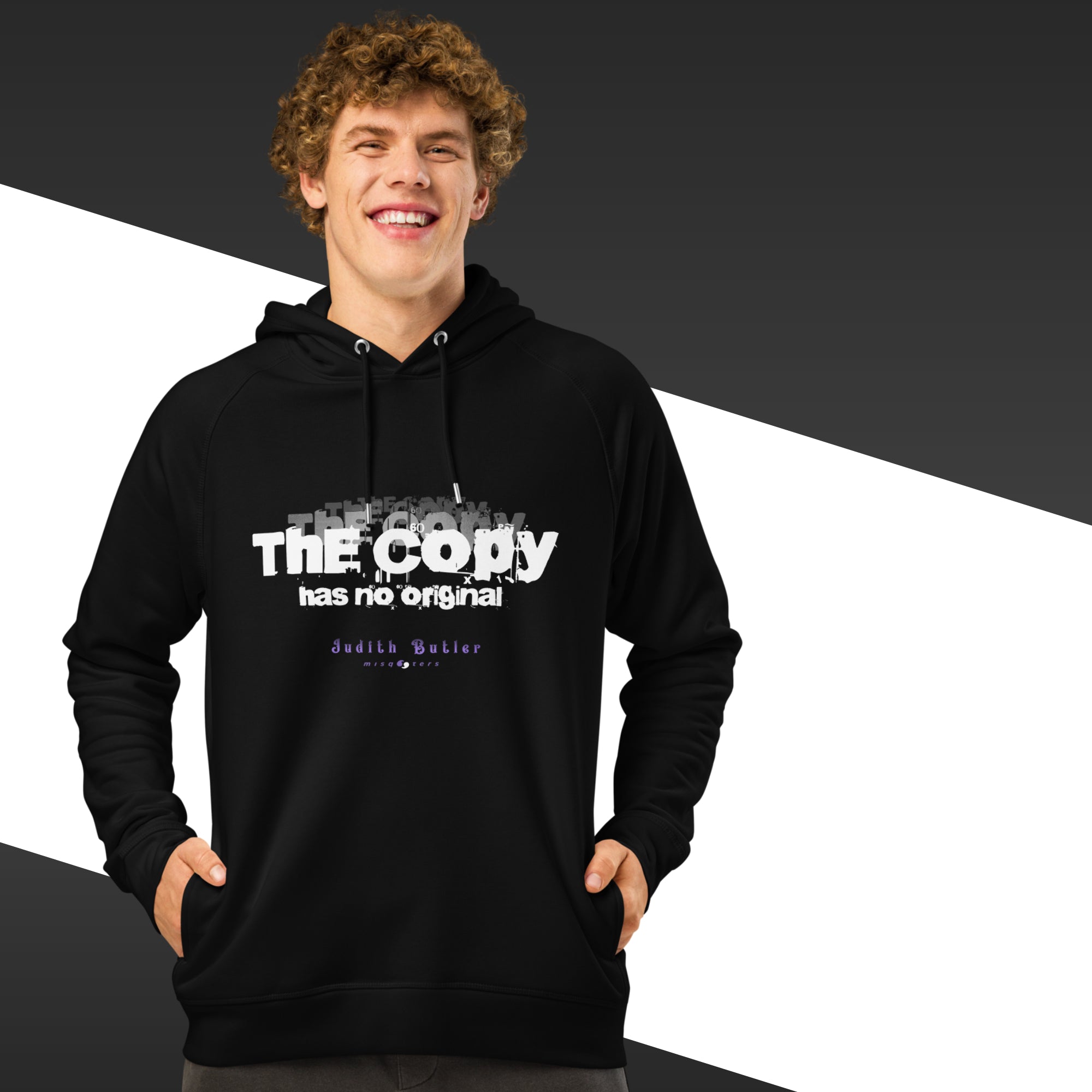 Person wearing a black hoodie with text on a black and white background