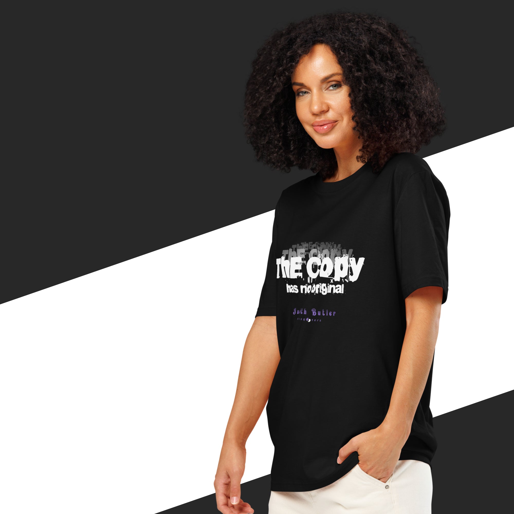 Woman wearing a black t-shirt with text on a black and white background