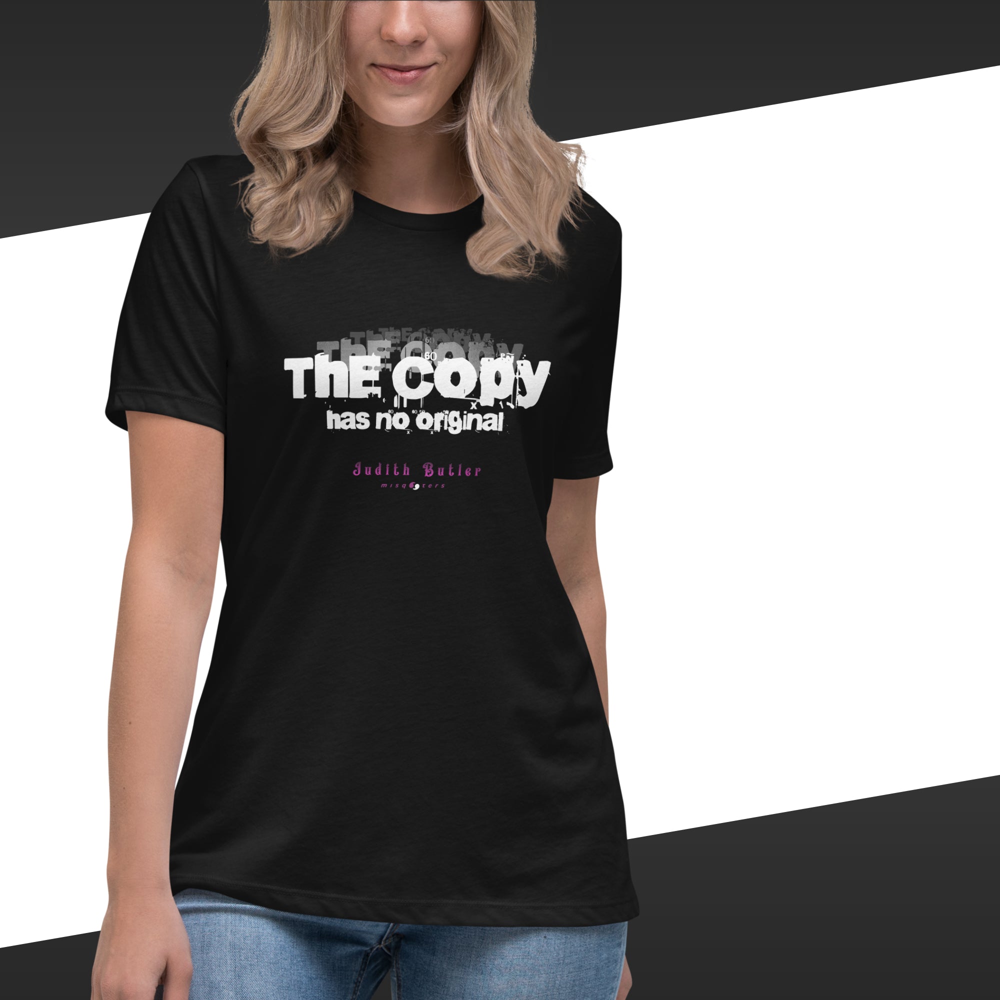 Person wearing a black t-shirt with white text on a white background