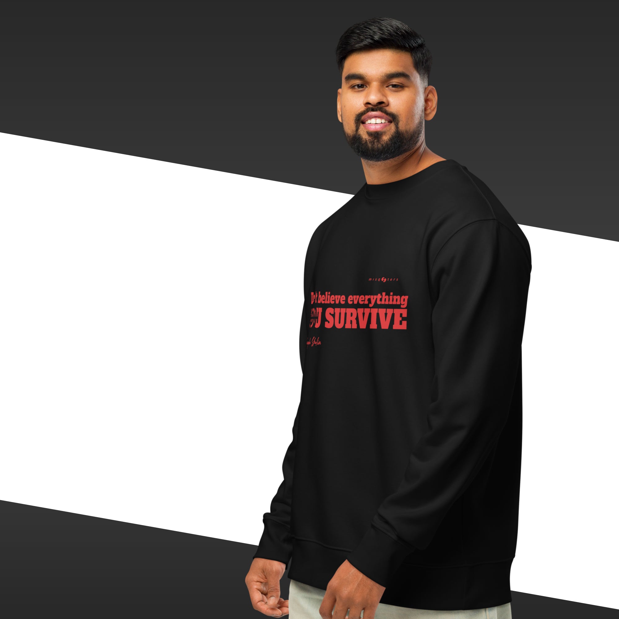 Man wearing a black long-sleeve shirt with red text on a black and white background