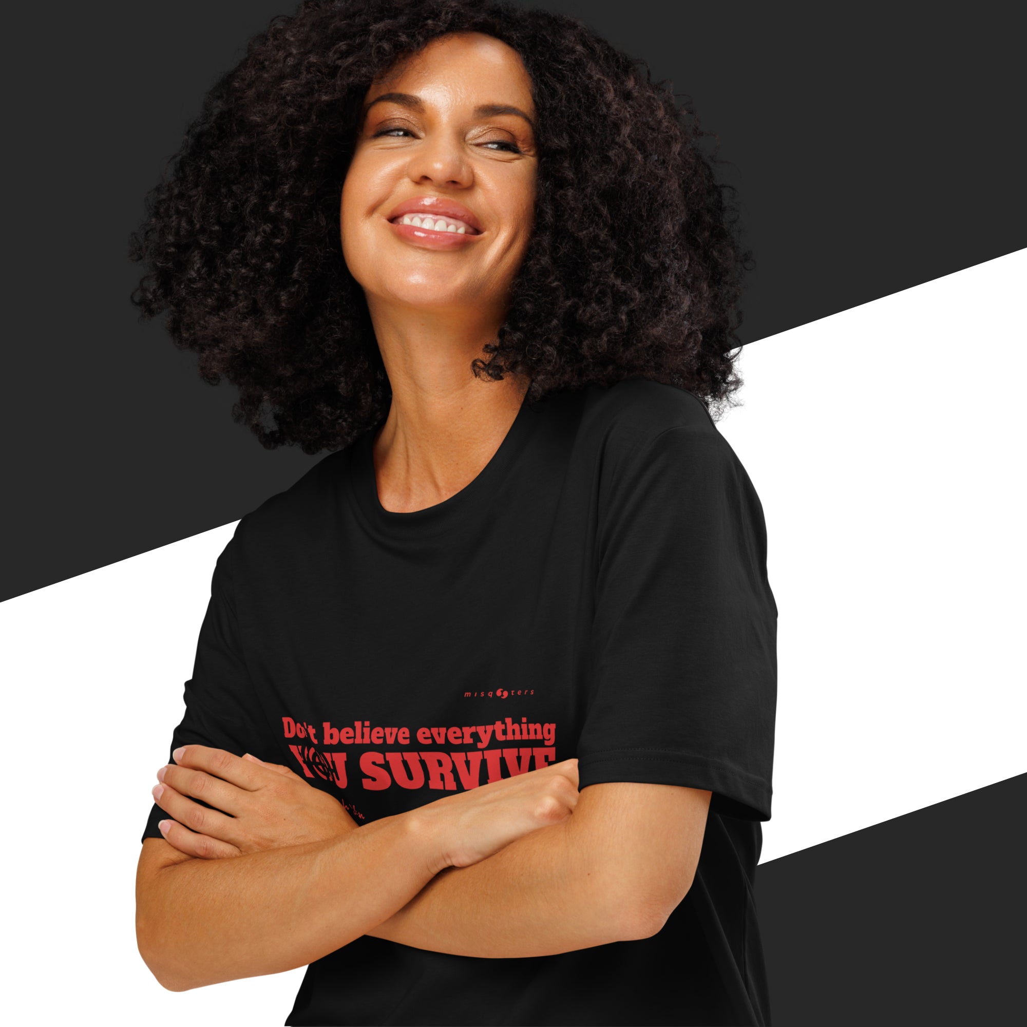 Woman wearing a black t-shirt with text, standing against a black and white background