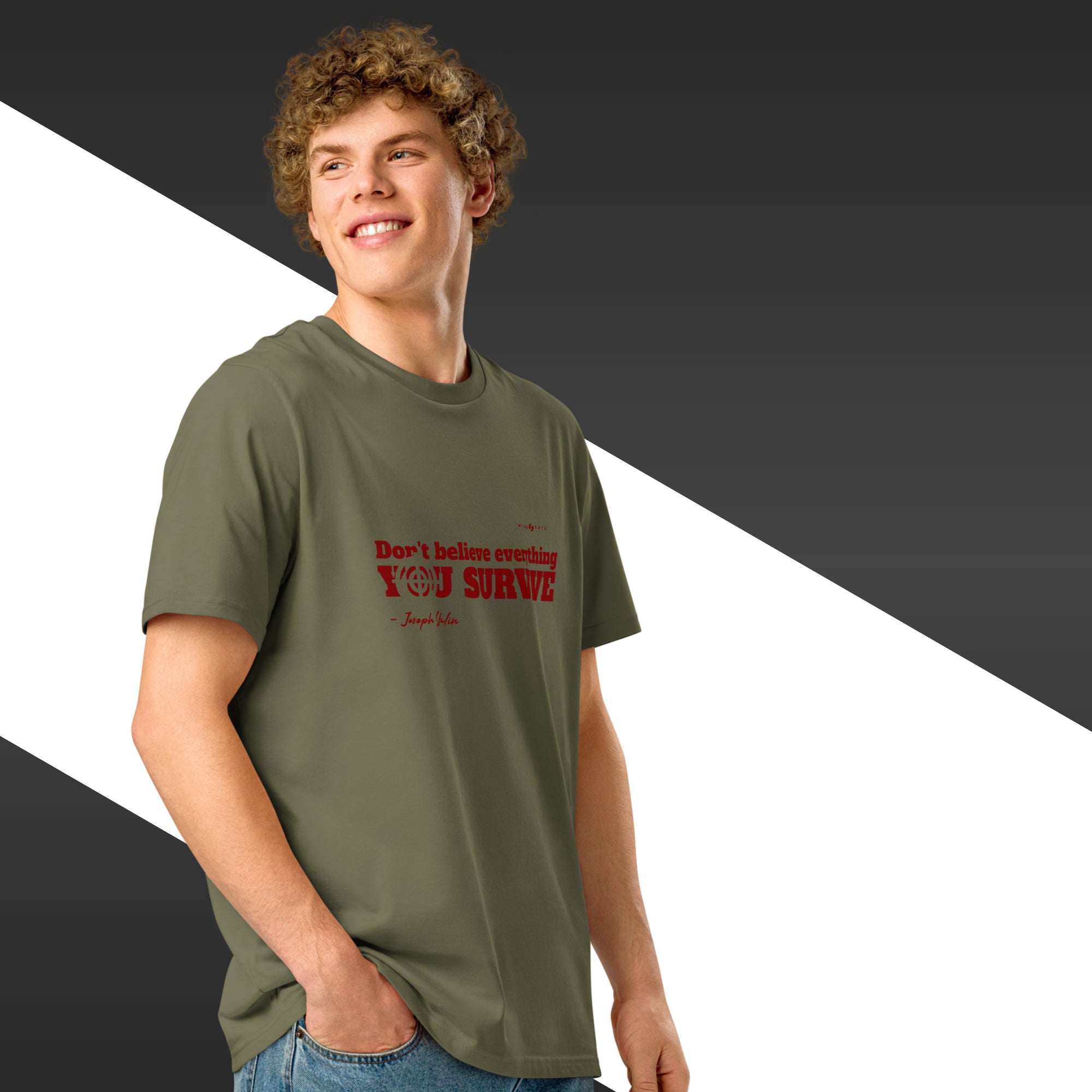Man wearing a green t-shirt with red text on a black and white background