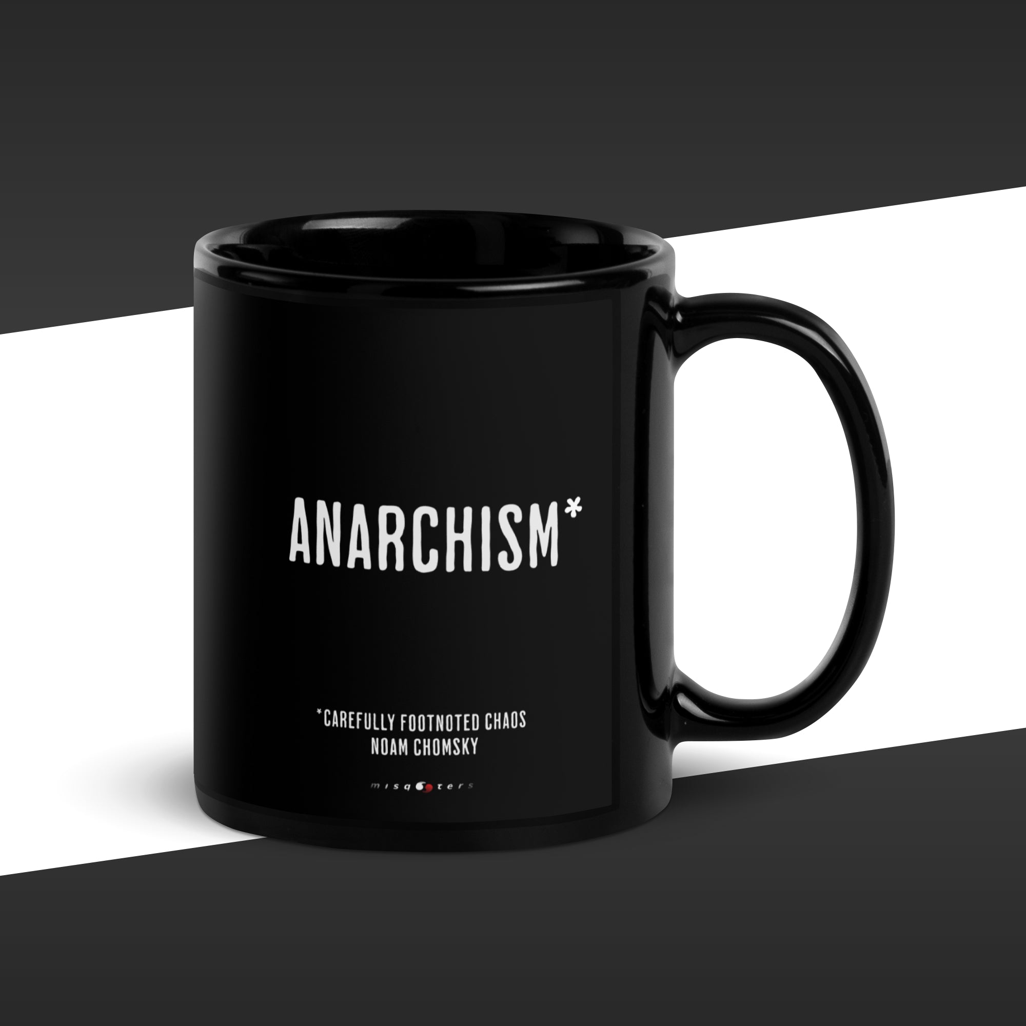 Black mug with 'ANARCHISM*' text on a black and white background