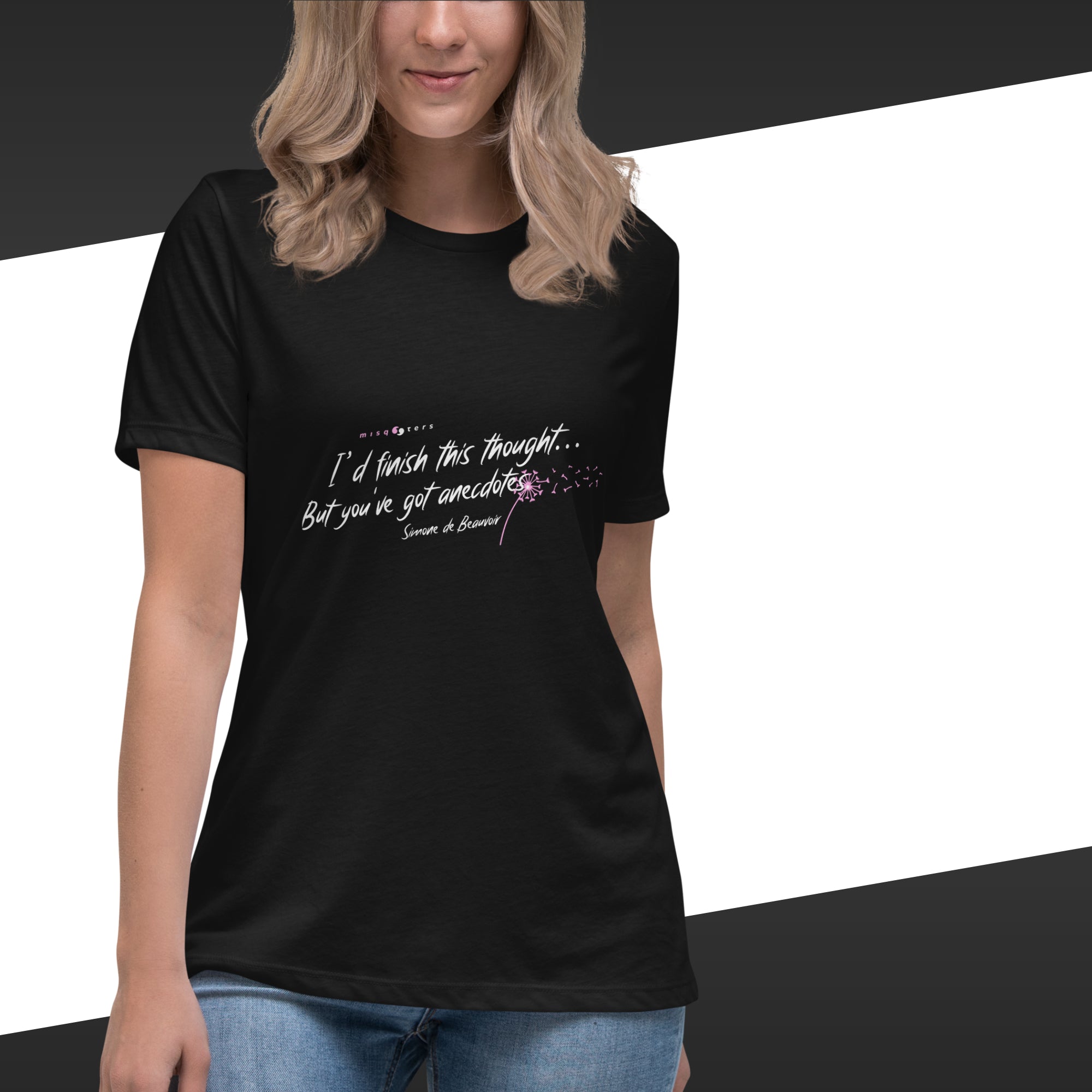 Person wearing a black t-shirt with white text on a white background