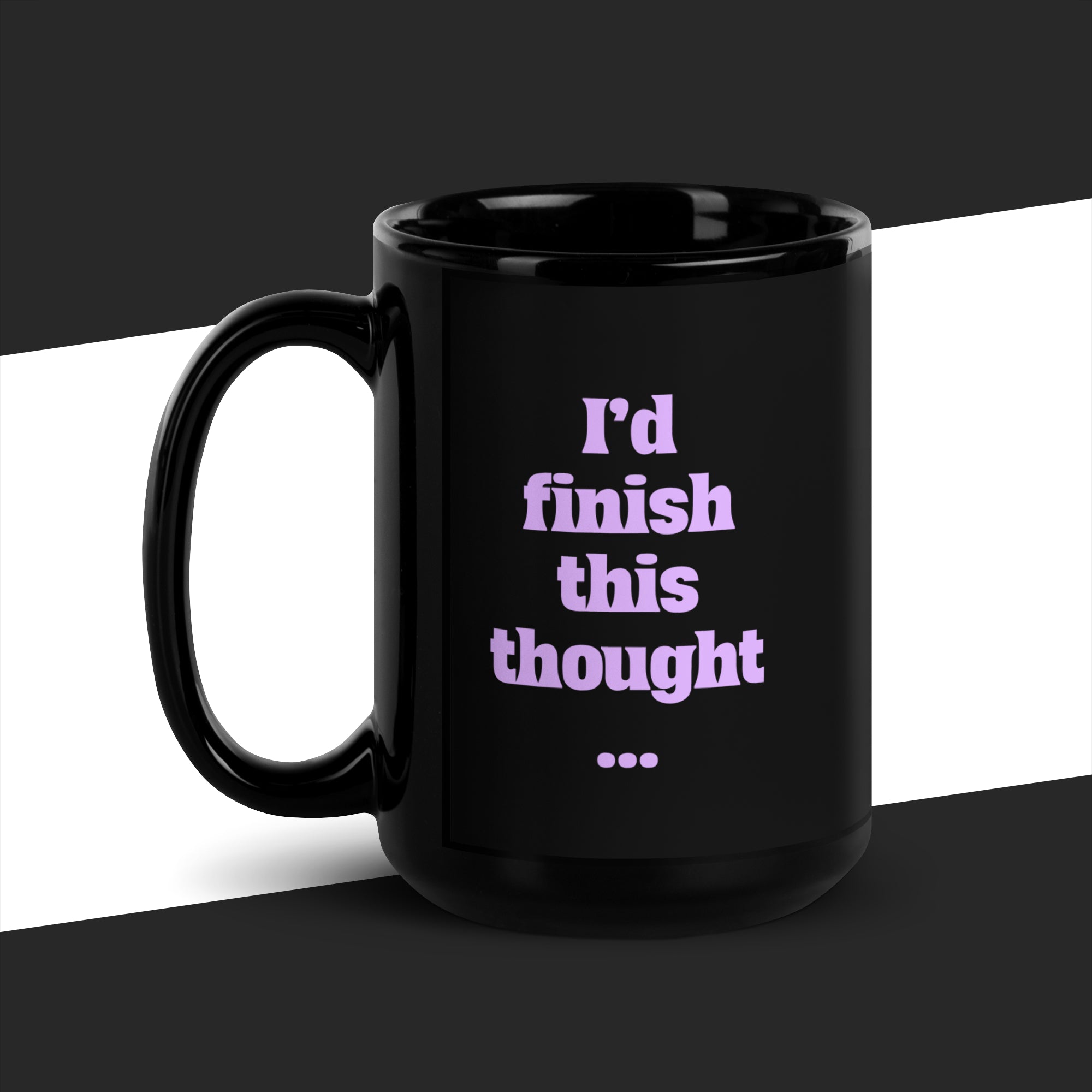 Big black mug with purple text 'I'd finish this thought...' on a black and white background