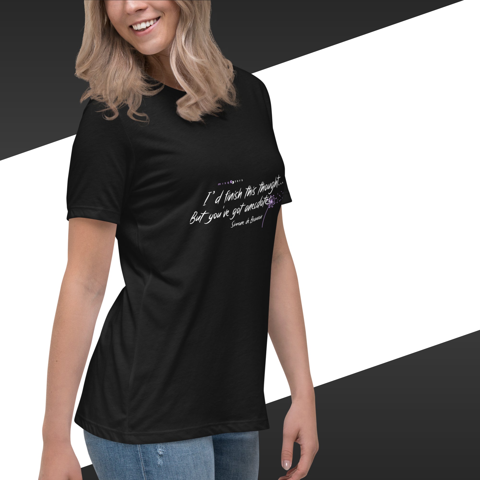 Person wearing a black t-shirt with text on a white background