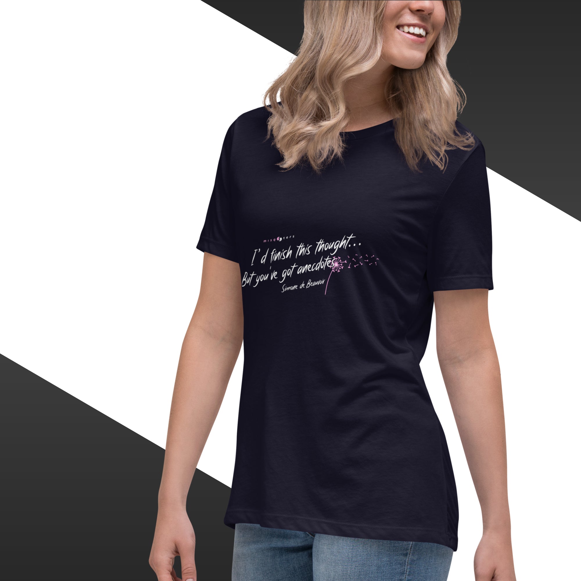 Person wearing a black t-shirt with text and a graphic design on a white background