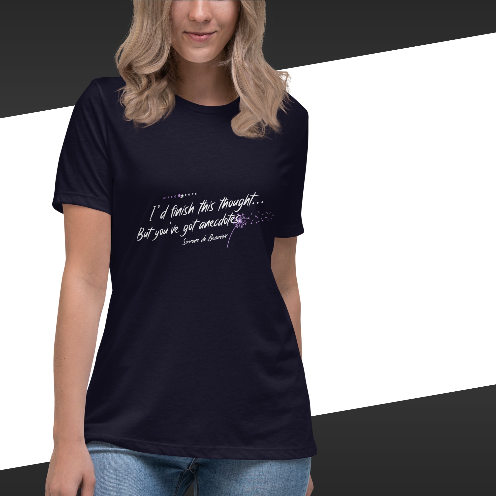 Person wearing a black t-shirt with white text on a white background