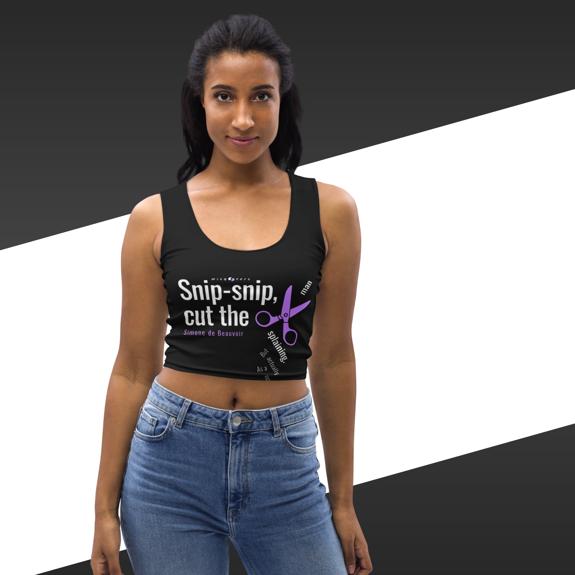 Woman wearing a black tank top with text and scissors graphic on a black and white background