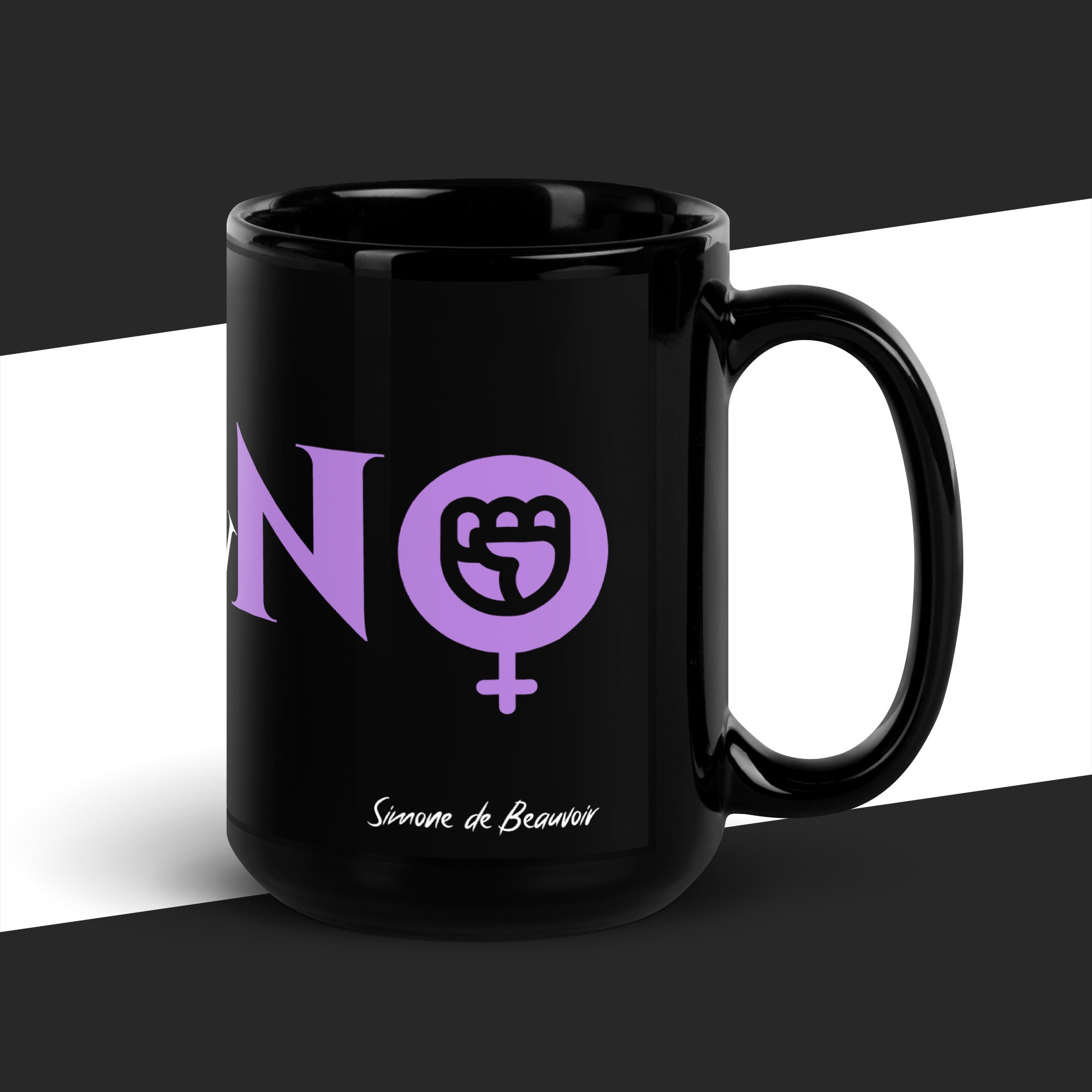 Black mug with purple graphic and text on a black and white background