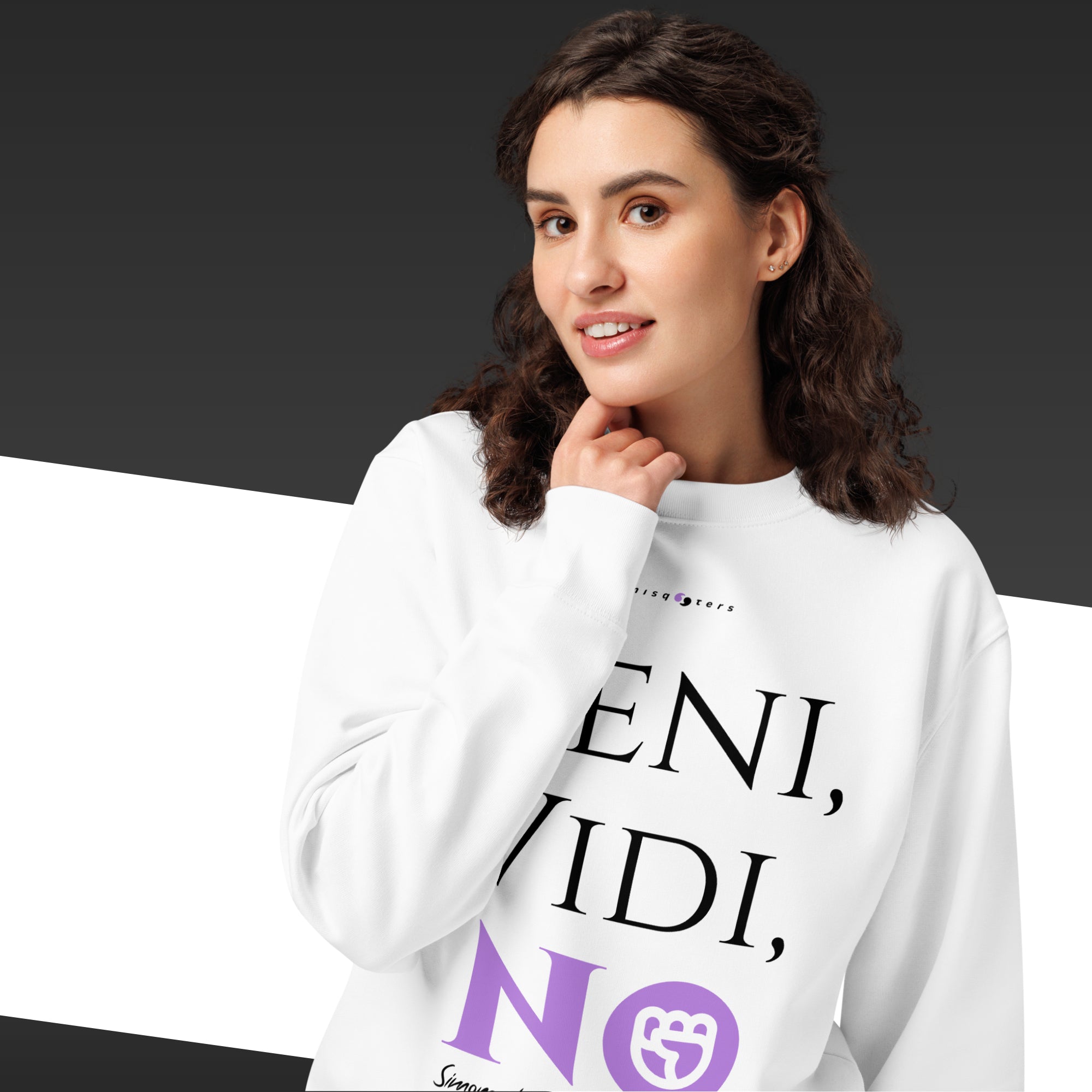 Woman wearing a white sweatshirt with text and logo on a dark background