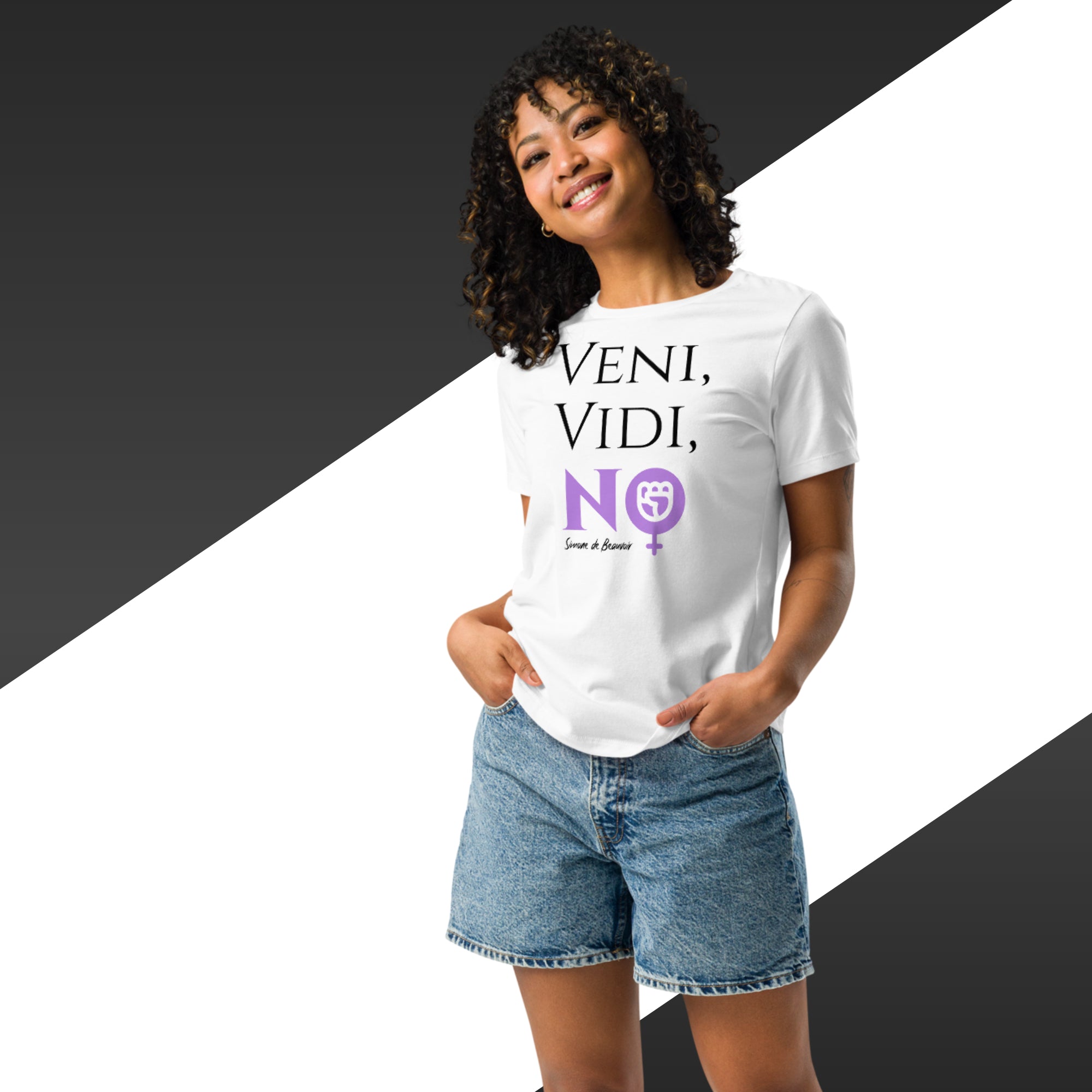 Person wearing a white t-shirt with text and symbols, standing against a black and white background