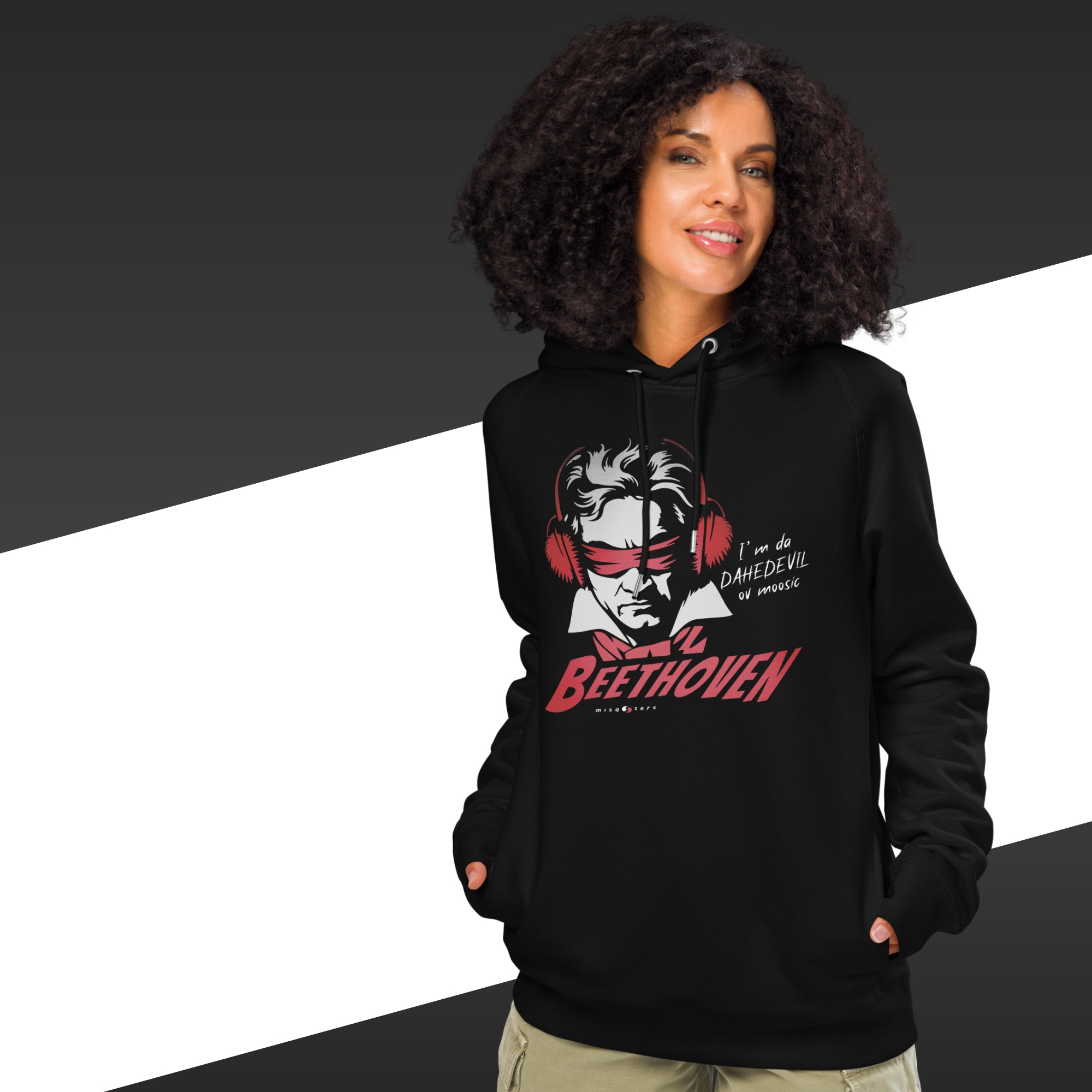 Person wearing a black hoodie with a graphic design of Beethoven, on a black and white background.