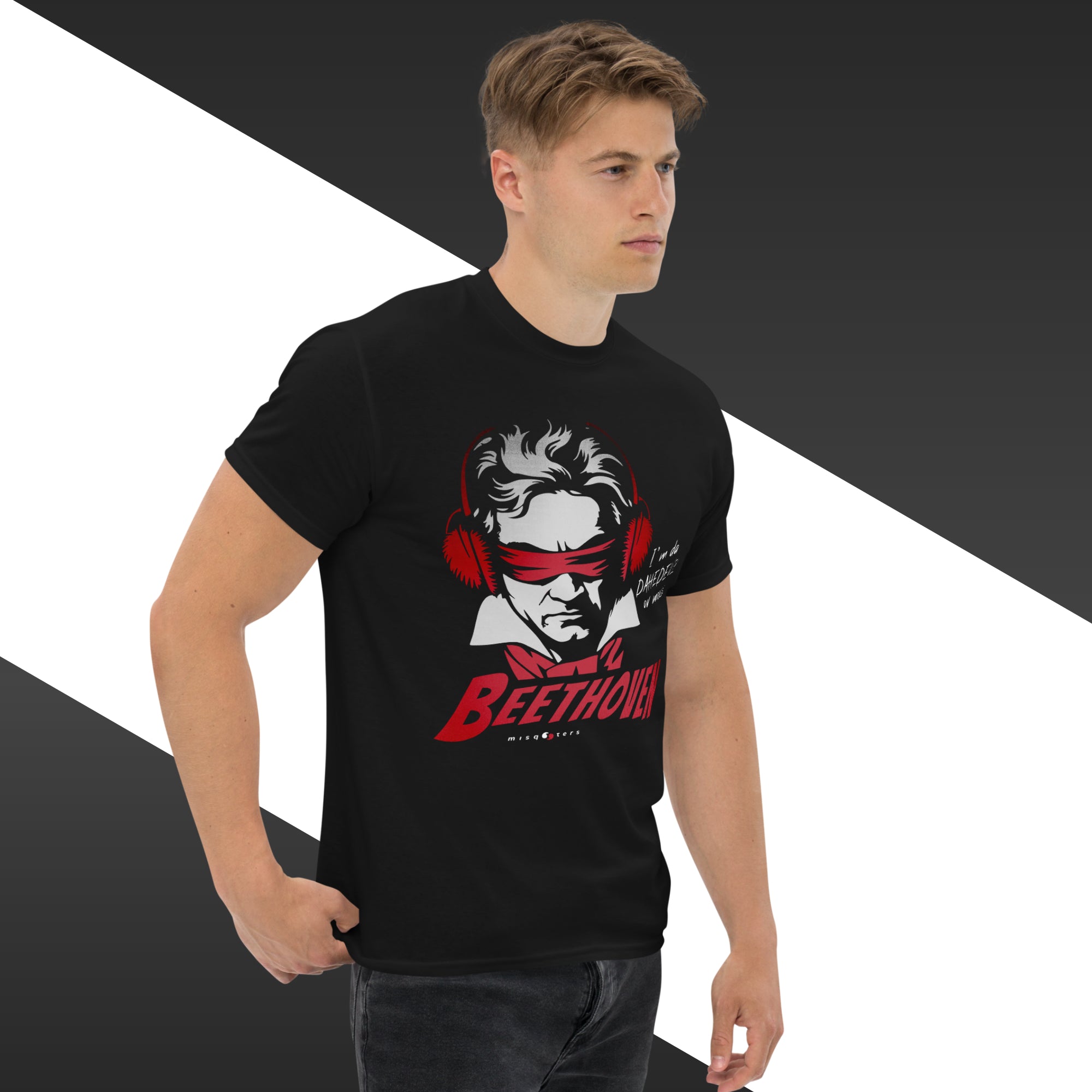 Man wearing a black t-shirt with a graphic design of Beethoven, on a black and white background.