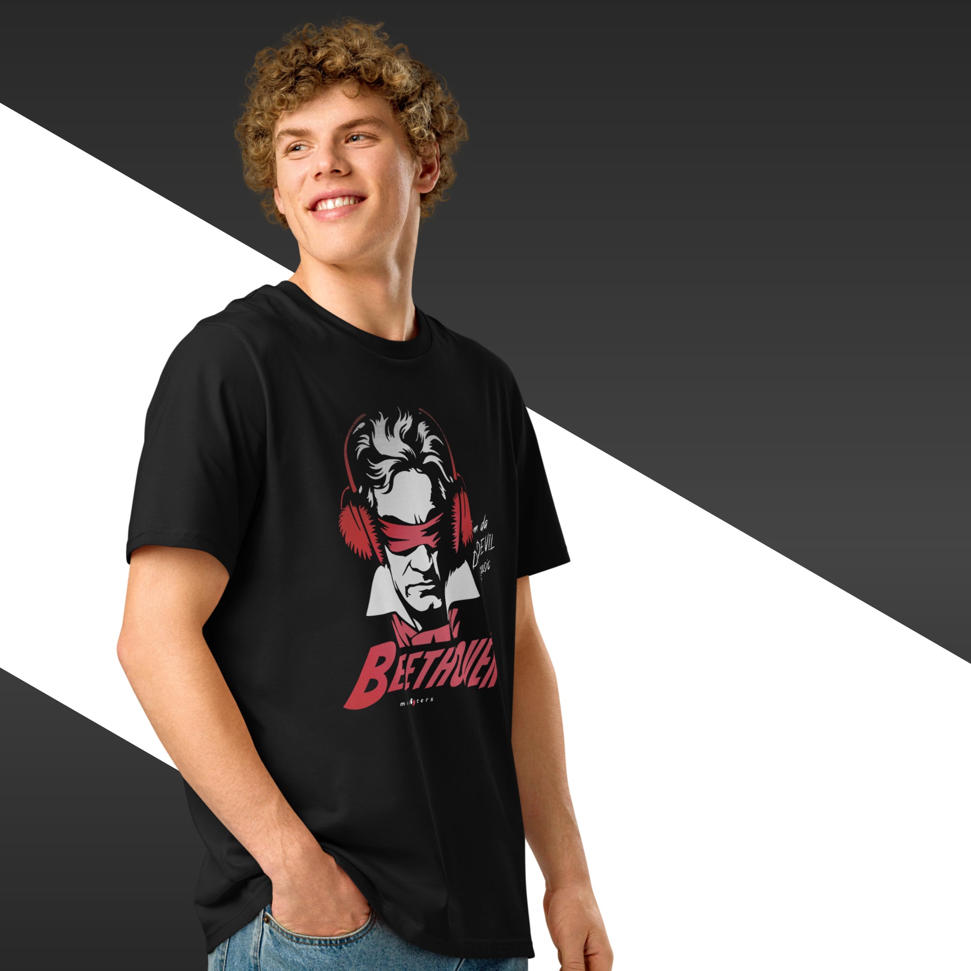Person wearing a black t-shirt with a graphic design on a black and white background