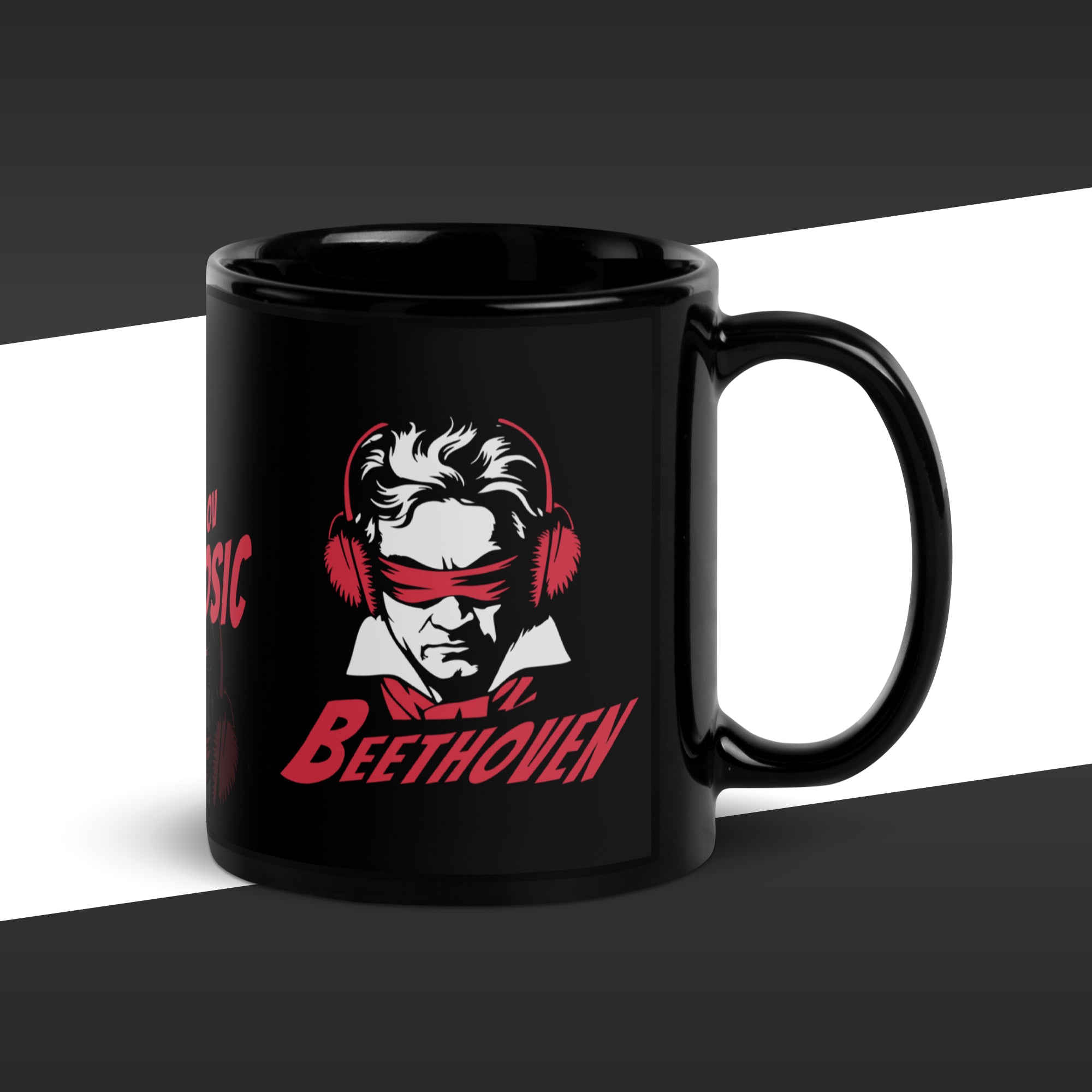 Black mug with a graphic of Beethoven wearing headphones on a white and black background