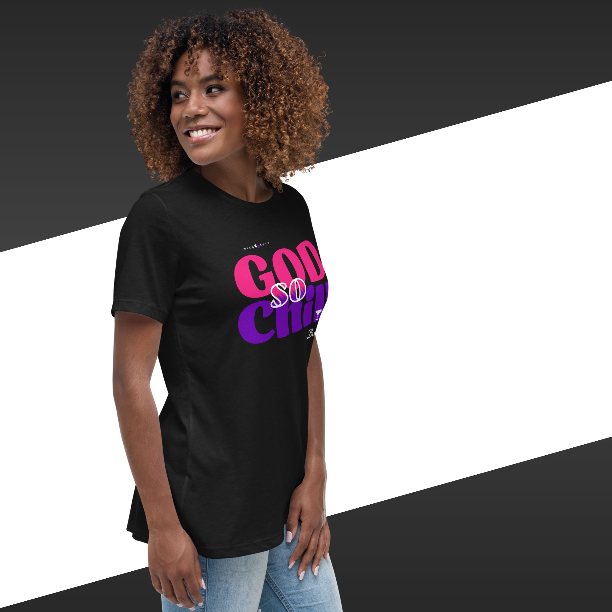 Woman wearing a black t-shirt with colorful text on a black and white background