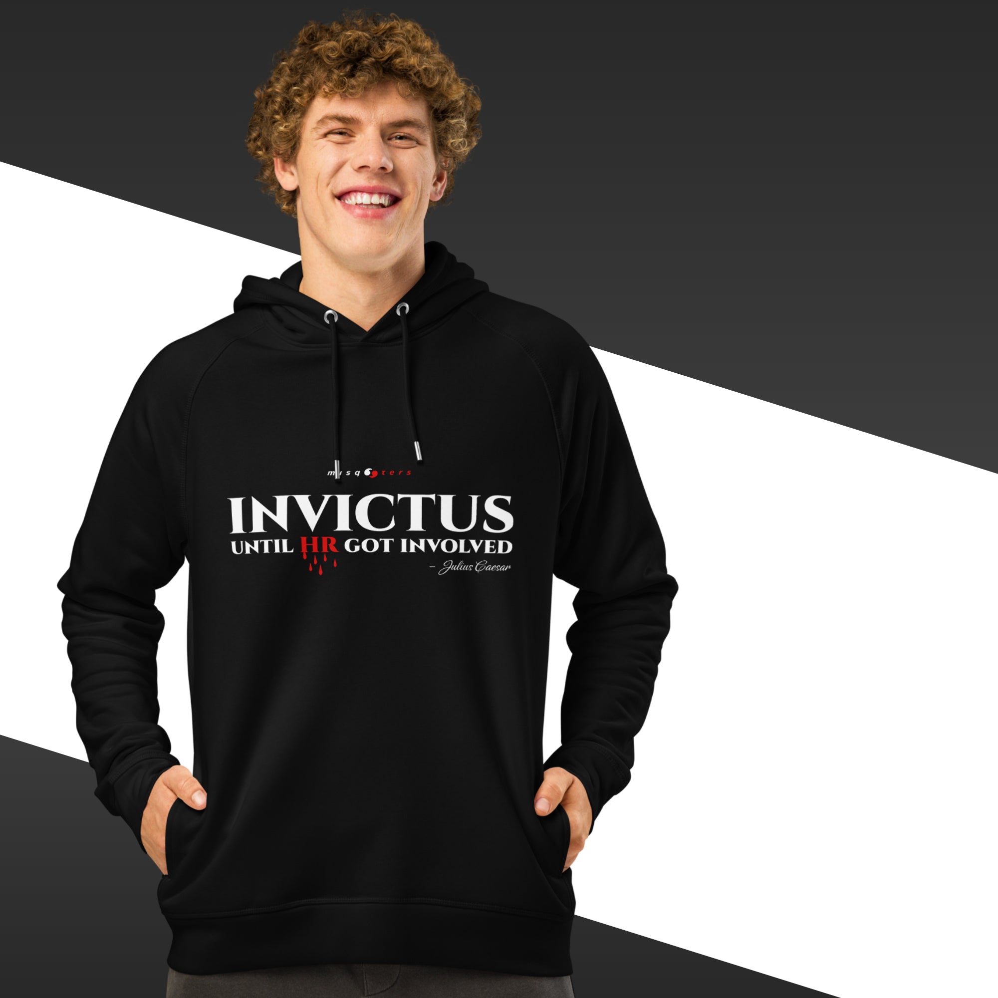 Person wearing a black hoodie with 'Invictus' text design on a gradient background