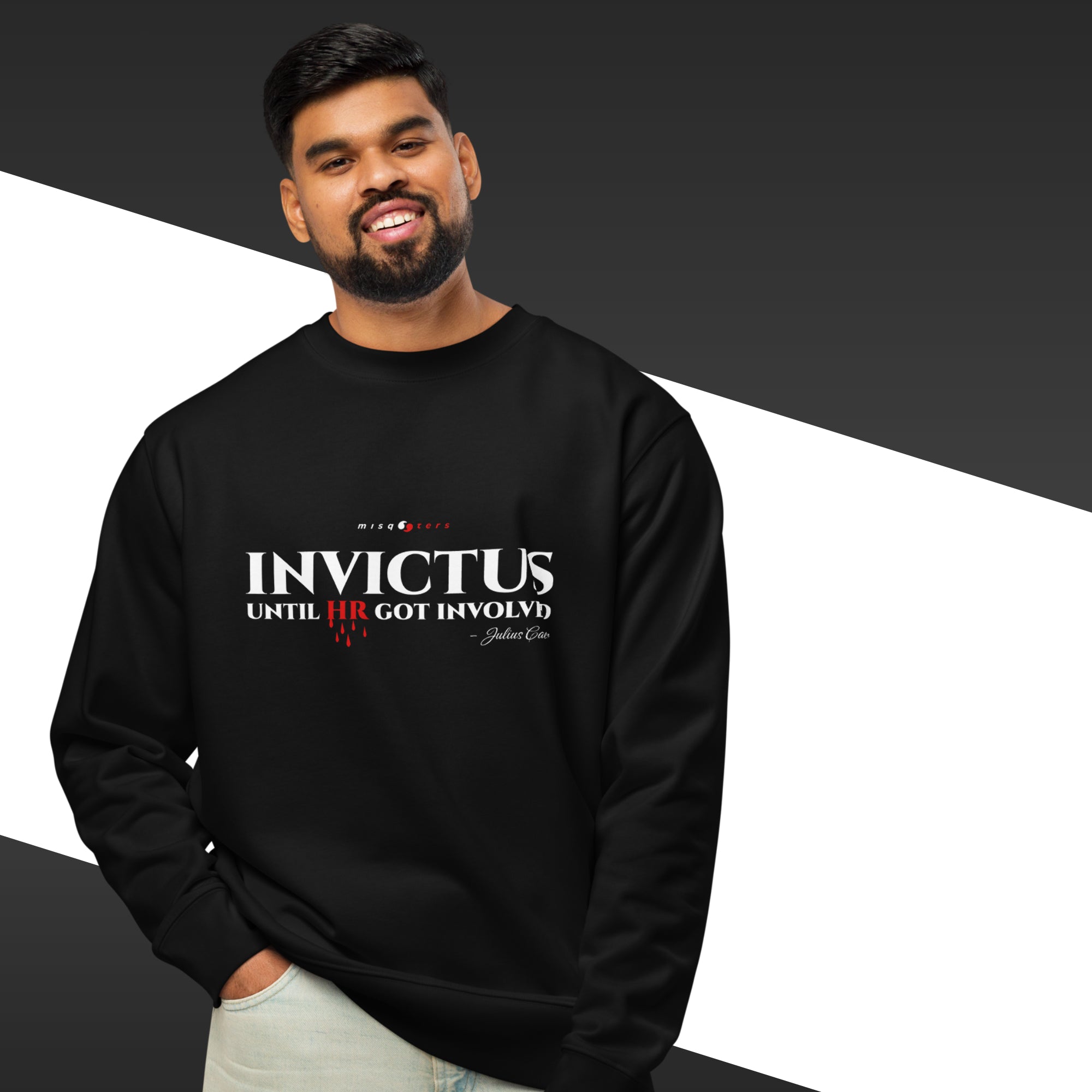 Man wearing a black sweatshirt with 'Invictus' text on a white background