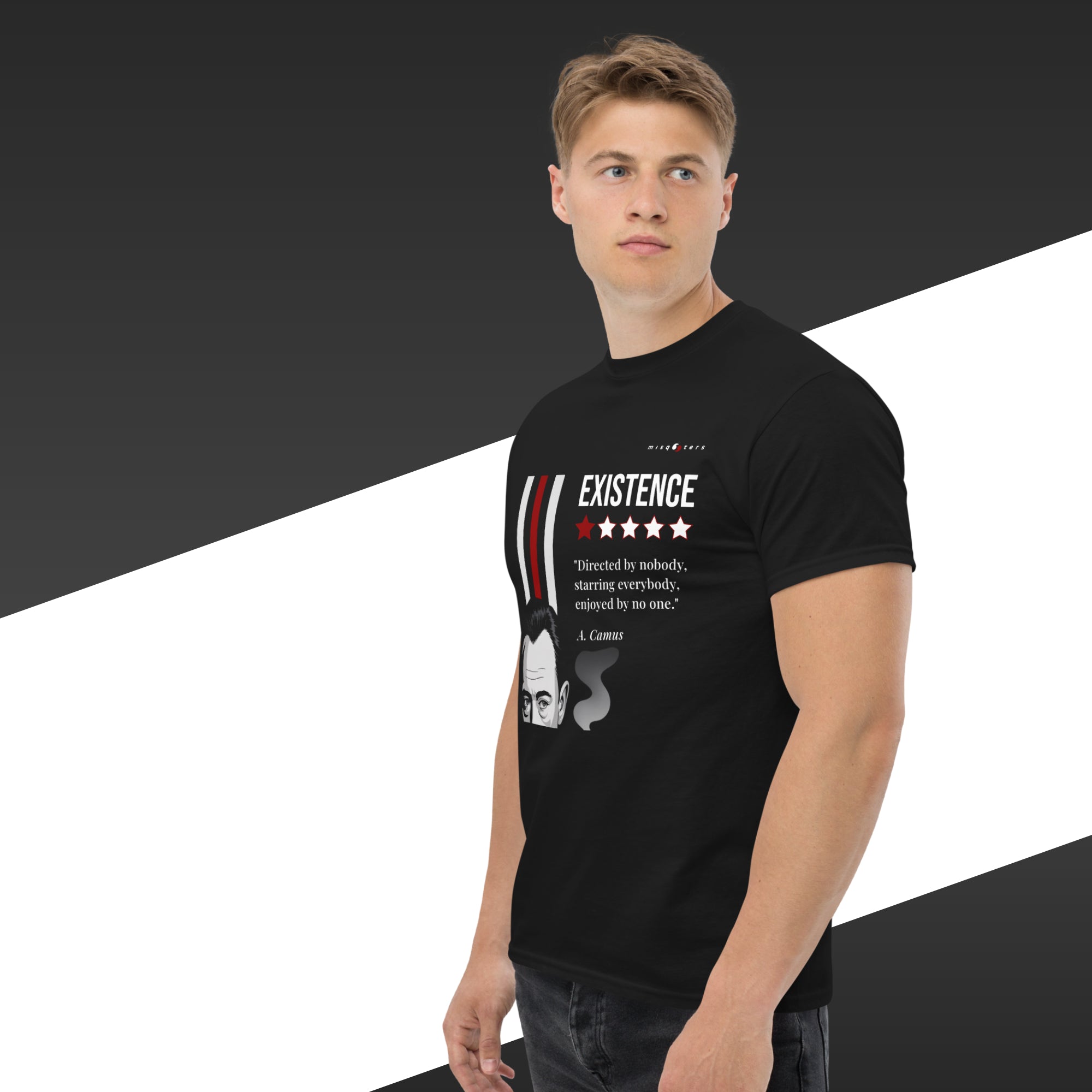 Man wearing a black t-shirt with text and graphic design on a black and white background