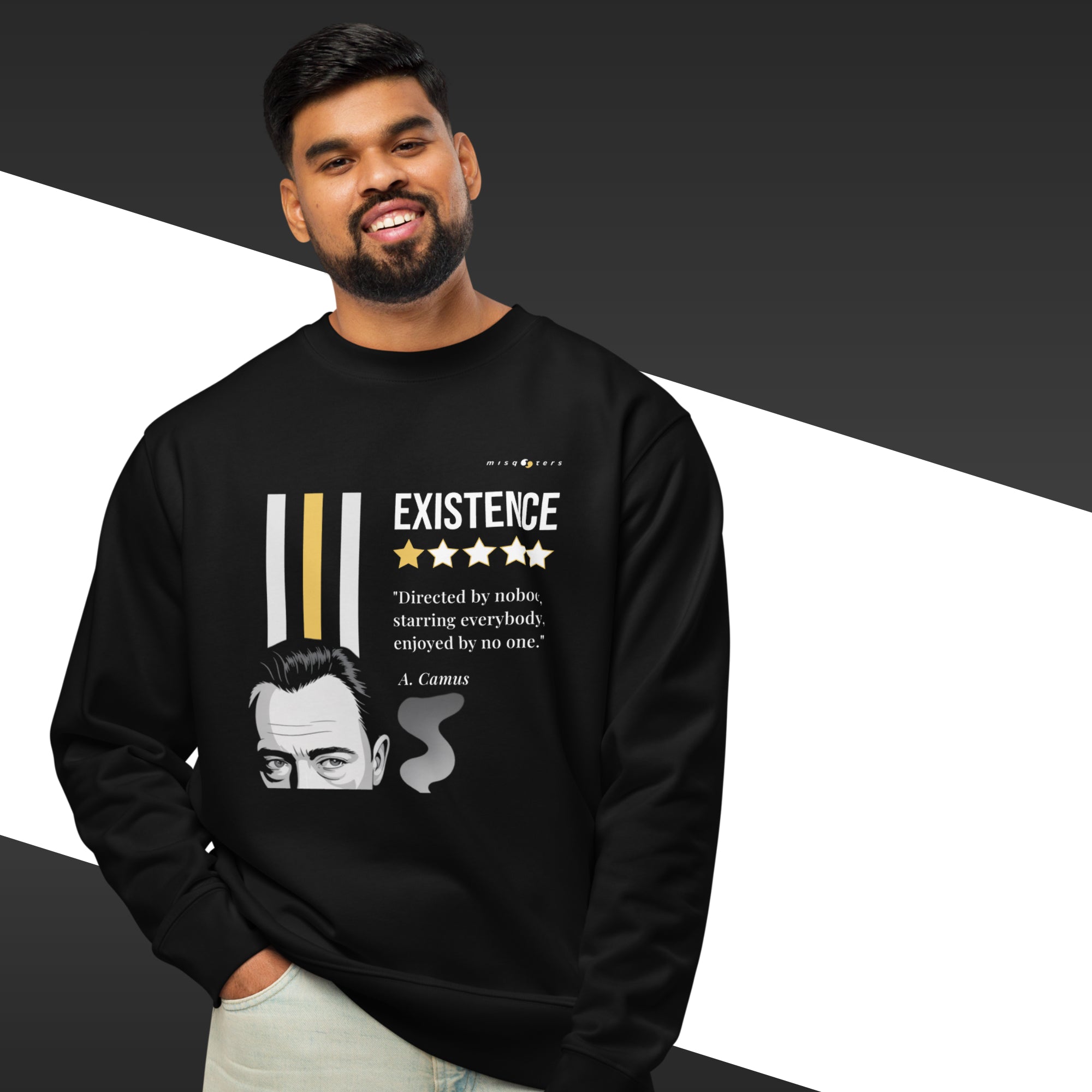 Person wearing a black sweatshirt with a graphic design and text.