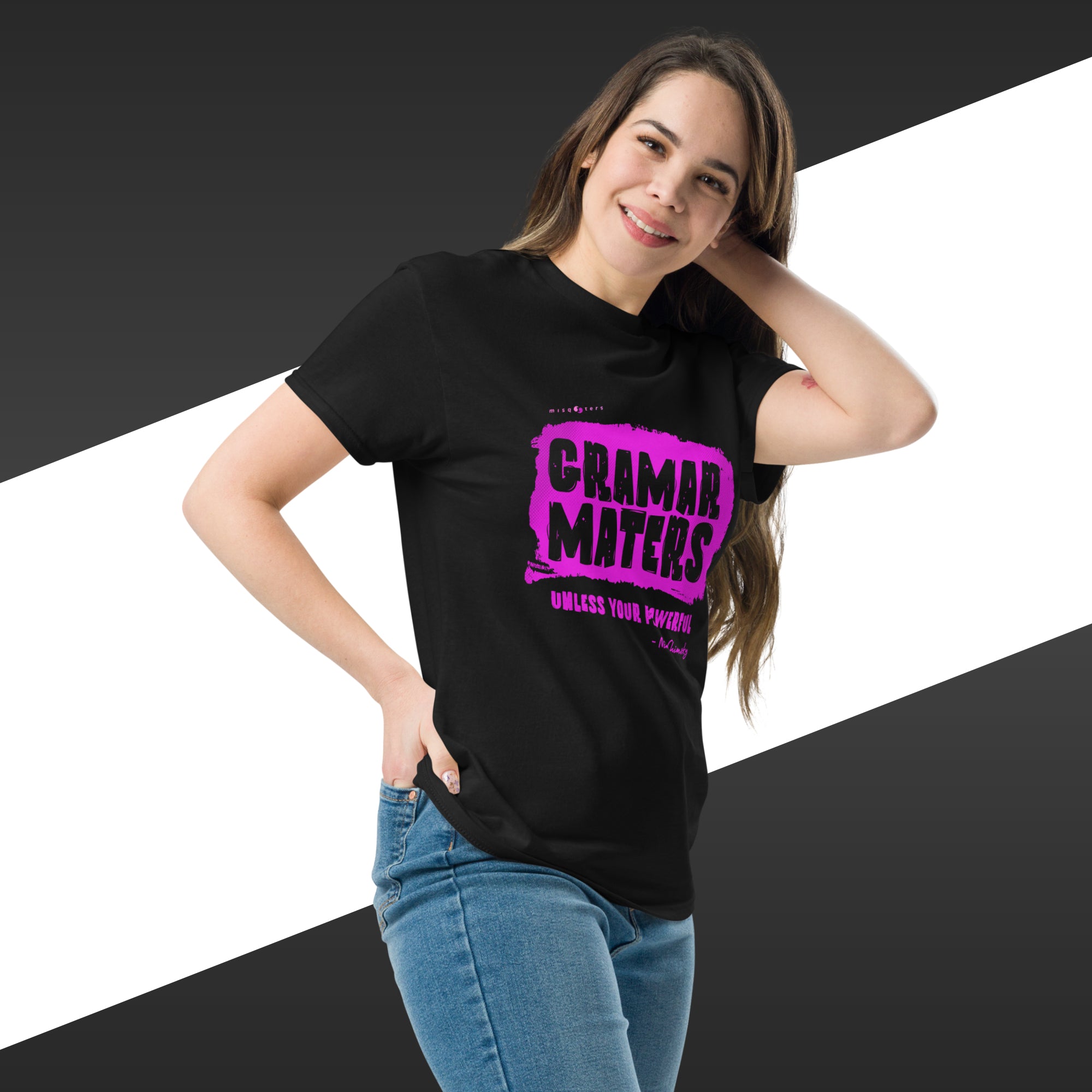 Woman wearing a black t-shirt with pink text on a white and black striped background