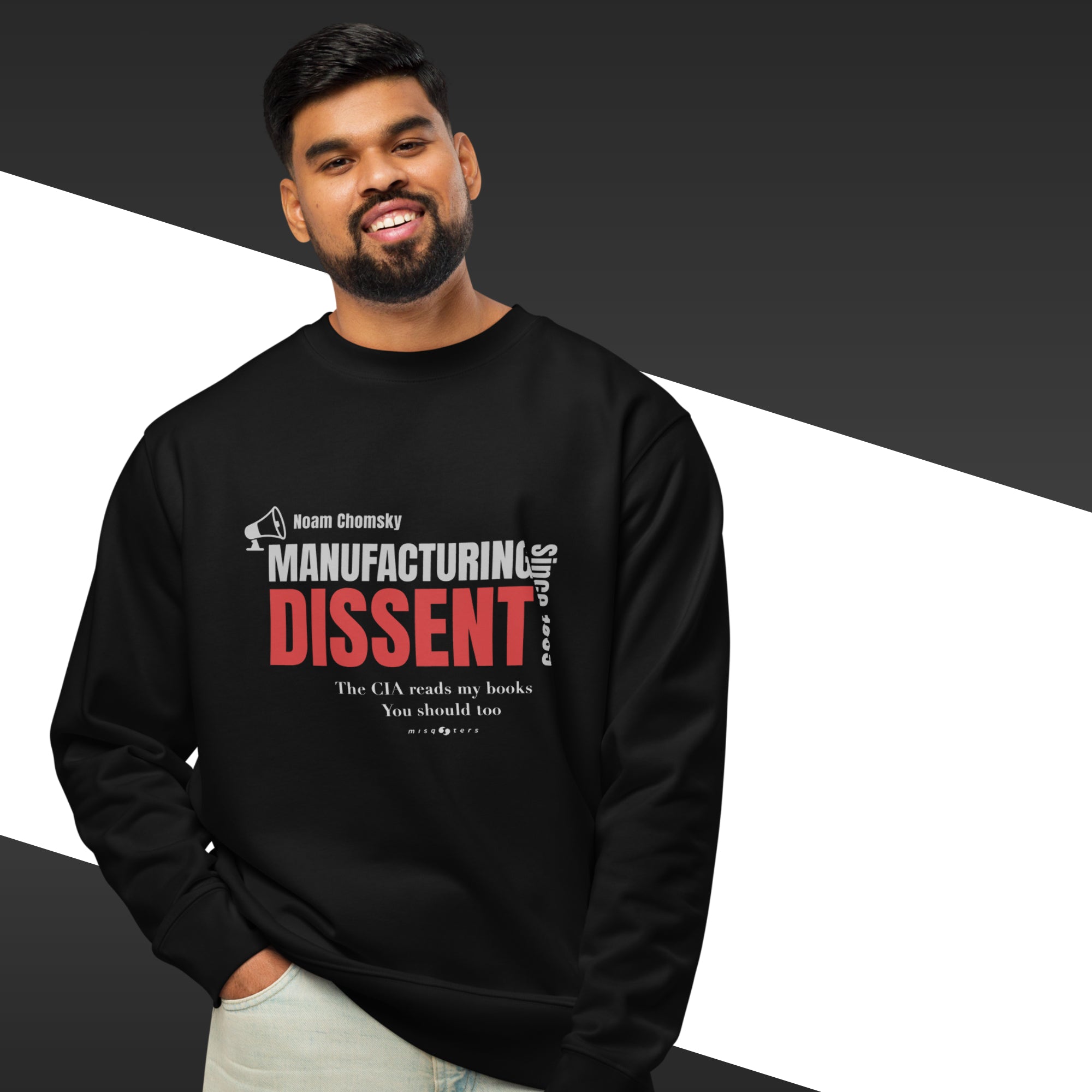 Man wearing a black sweatshirt with the text "manufacturig dissent"