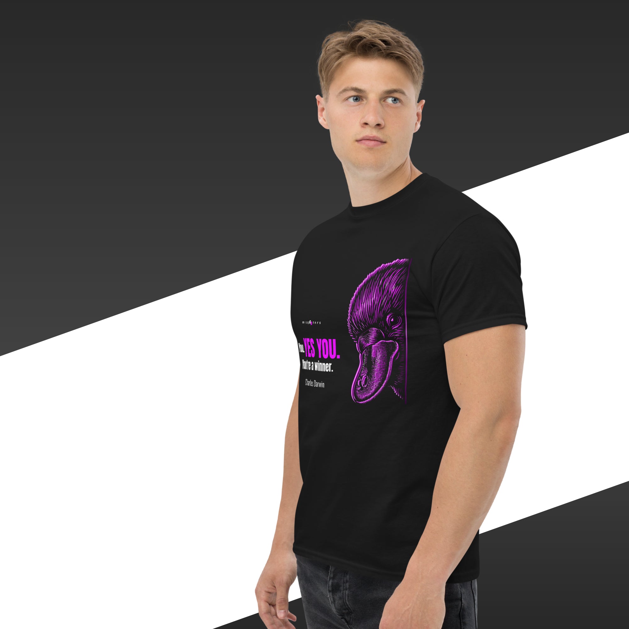 Man wearing a black t-shirt with a purple graphic design on a black and white background
