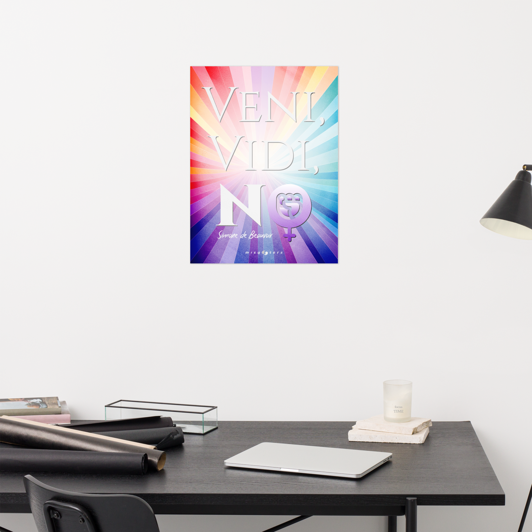 Colorful poster with 'Veni Vidi Noli' on a wall above a desk.