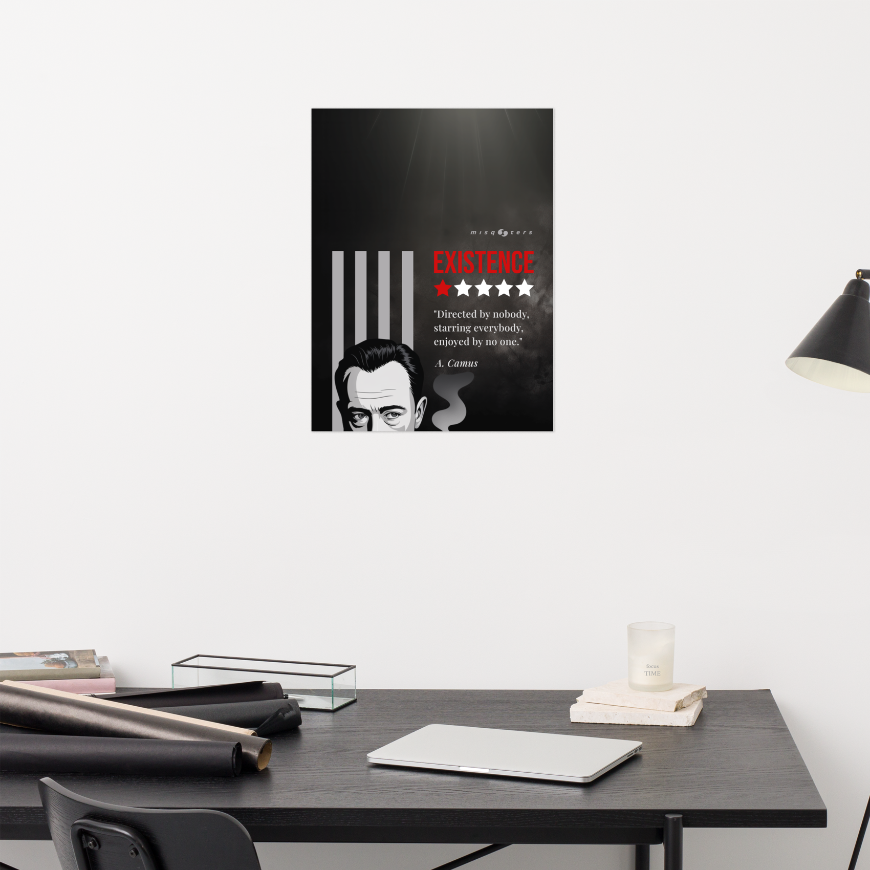 Poster with a stylized portrait and text on a wall above a desk.