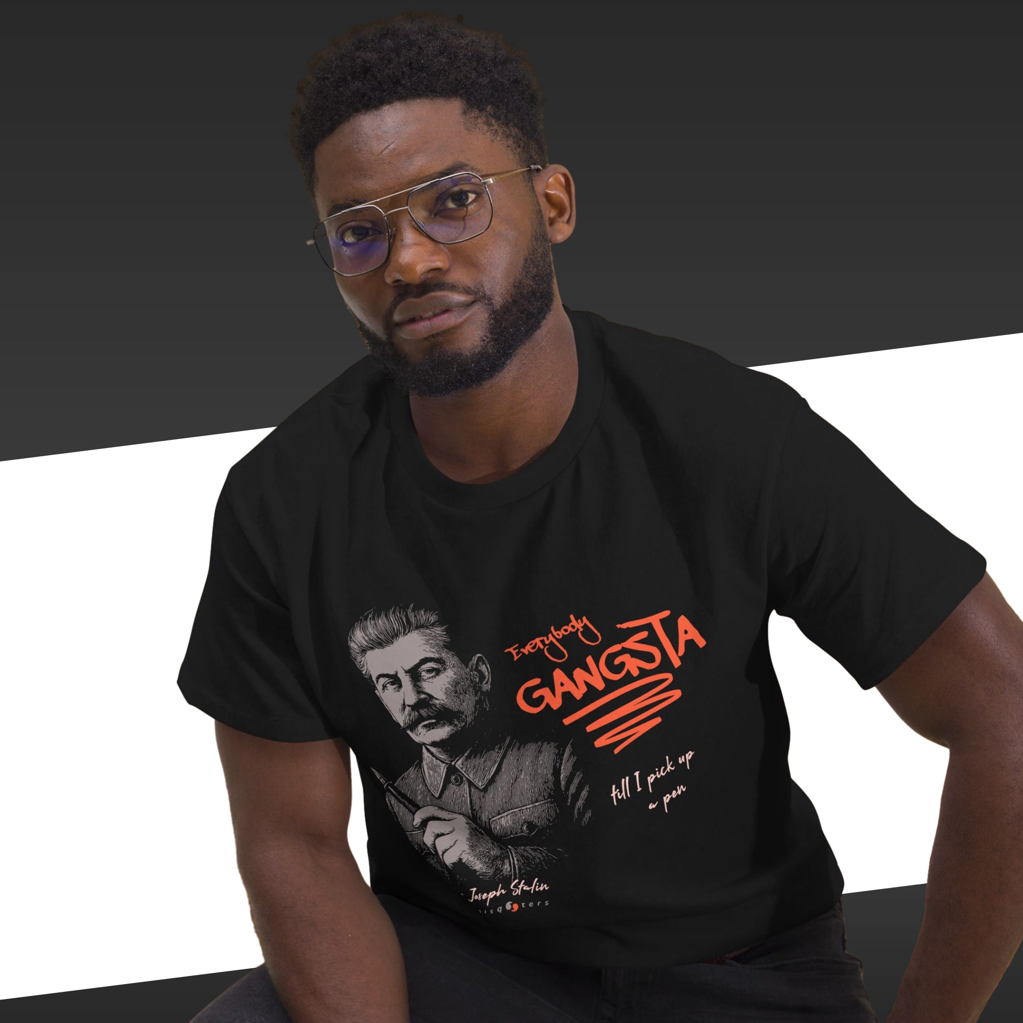 Man wearing a black t-shirt with a graphic design and text.