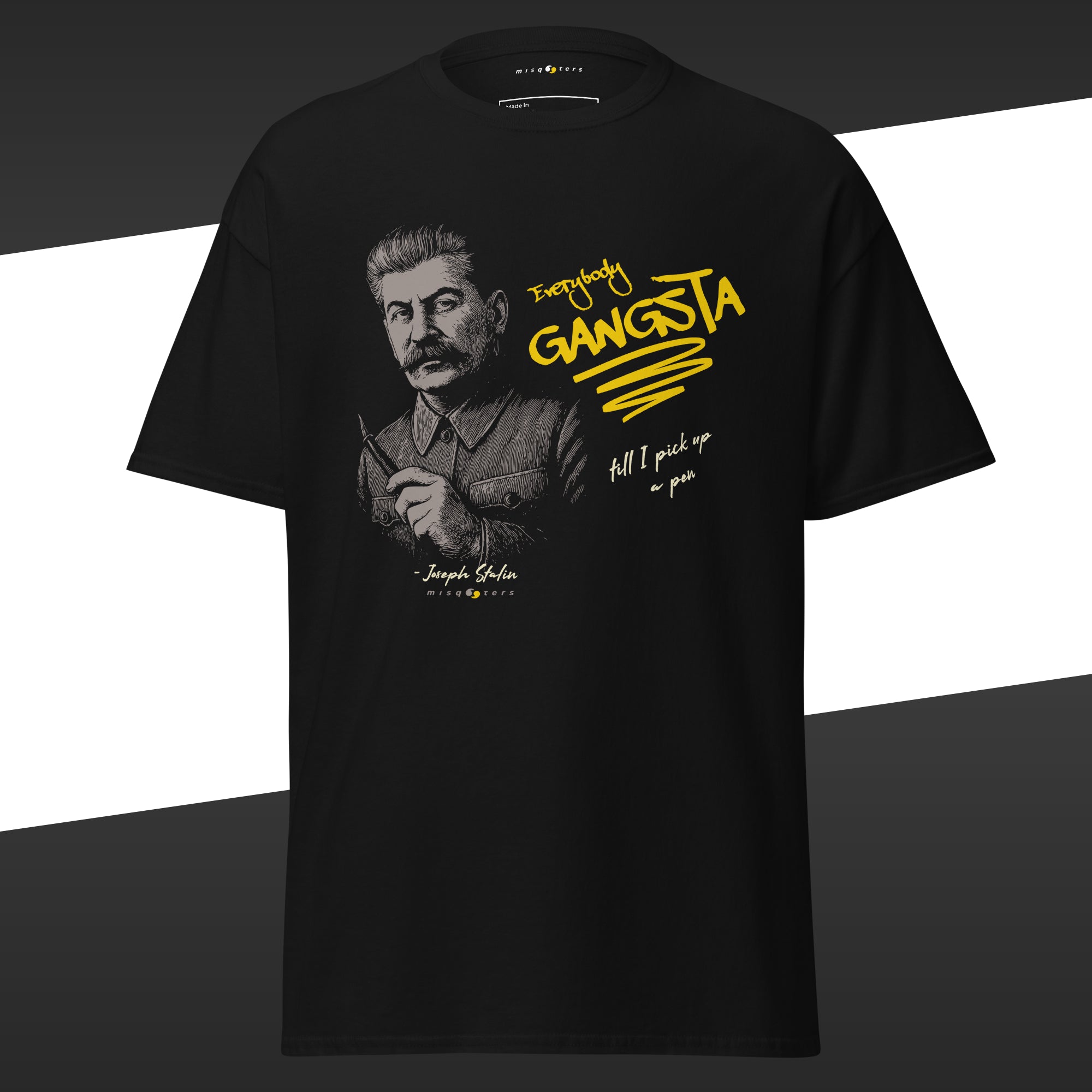 Black t-shirt with a graphic of Stalin and in yellow the misquote "Everybody gangsta till I pick up my pen"