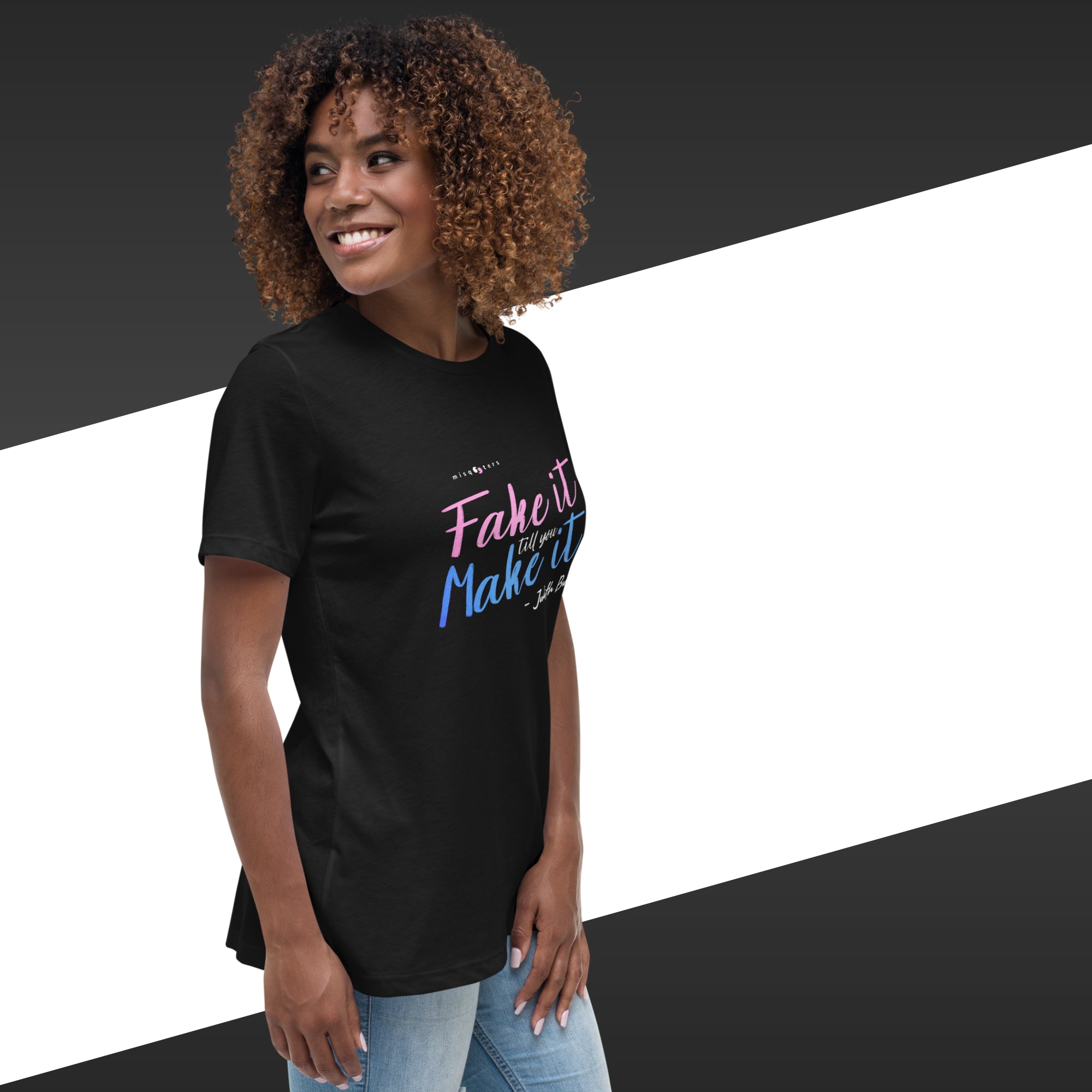 Woman wearing a black t-shirt with colorful text on a black and white background
