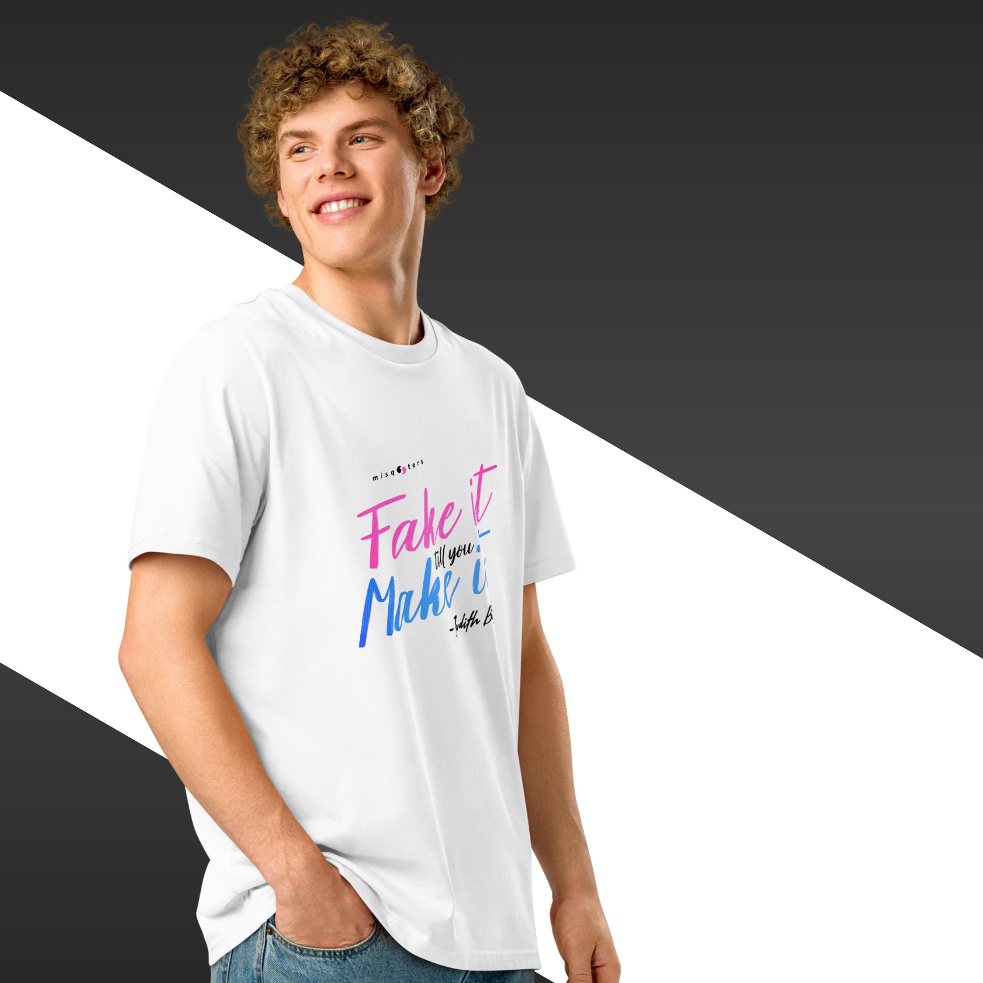Person wearing a white t-shirt with colorful text on a black and white background