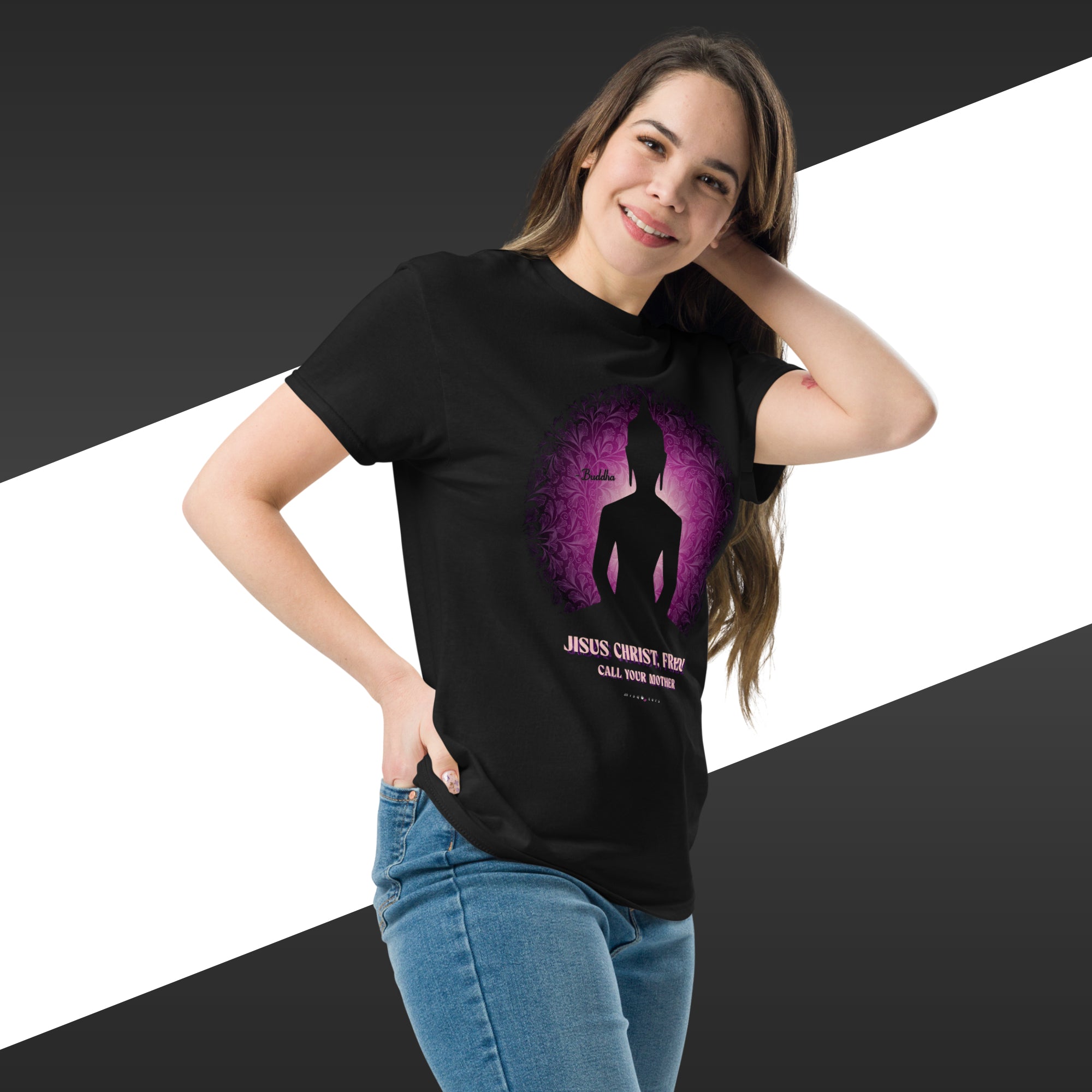 Woman wearing a black t-shirt with a graphic design on a white and black striped background