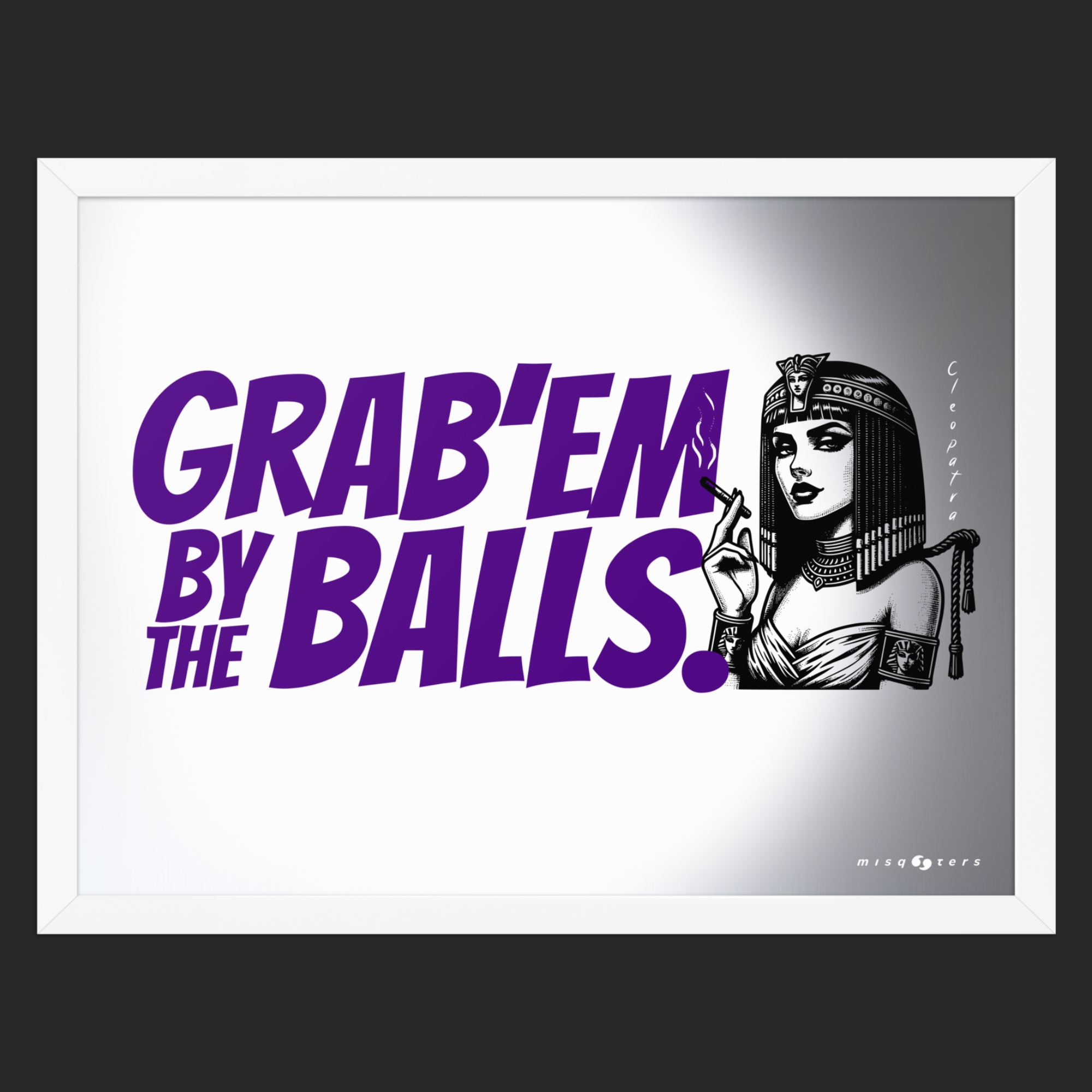 Framed artwork with a graphic of a woman and text 'GRAB'EM BY THE BALLS.' in purple on a gray background.