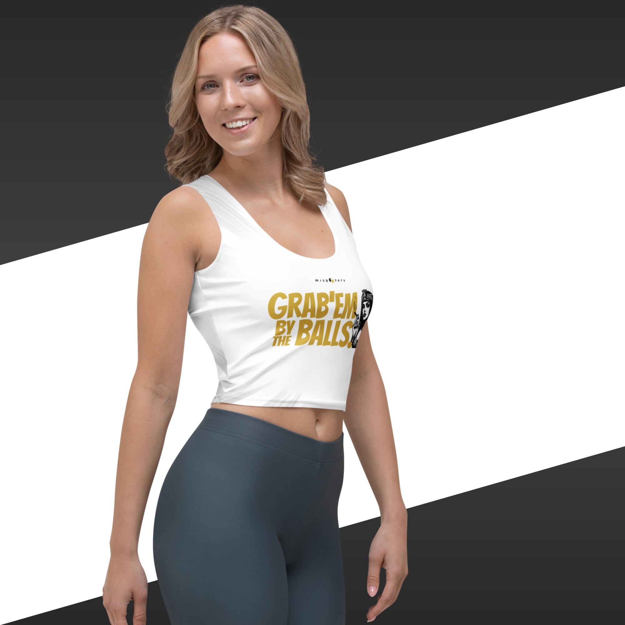 Woman wearing a white tank top with text and dark leggings on a black and white background