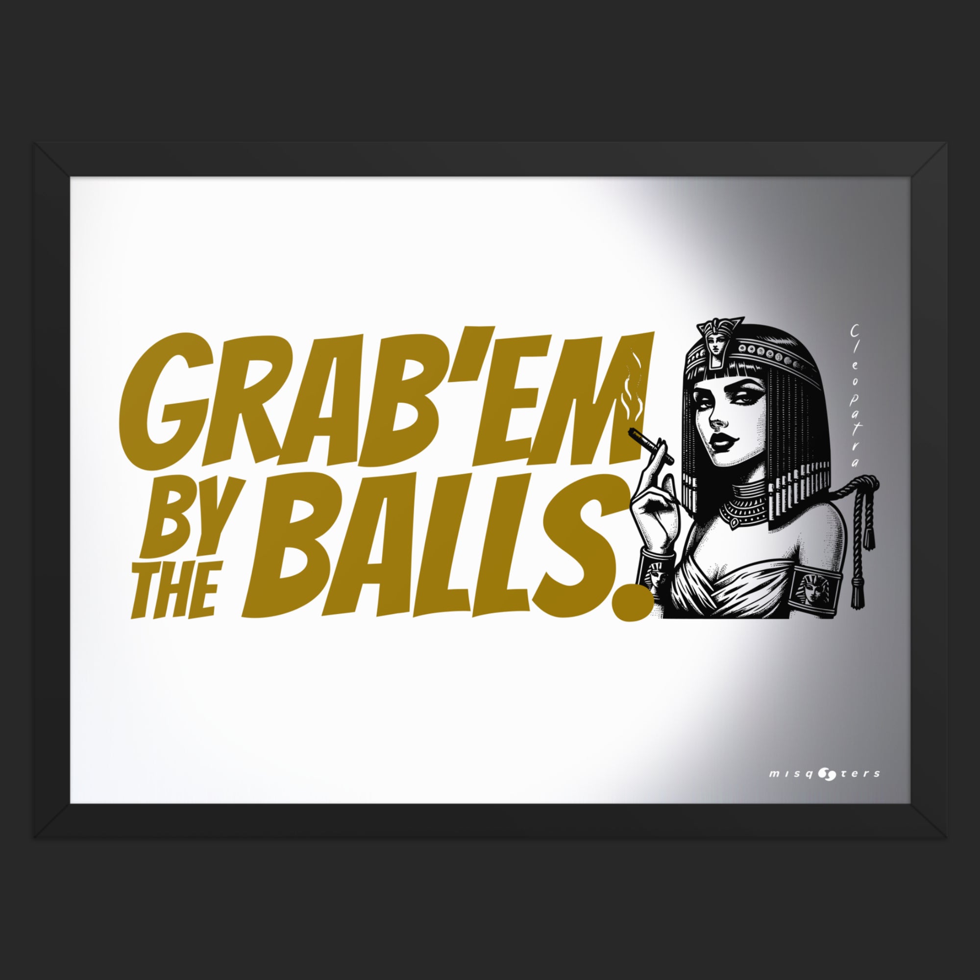 Framed artwork with text 'GRAB'EM BY THE BALLS.' and a stylized illustration of a woman in a headscarf.