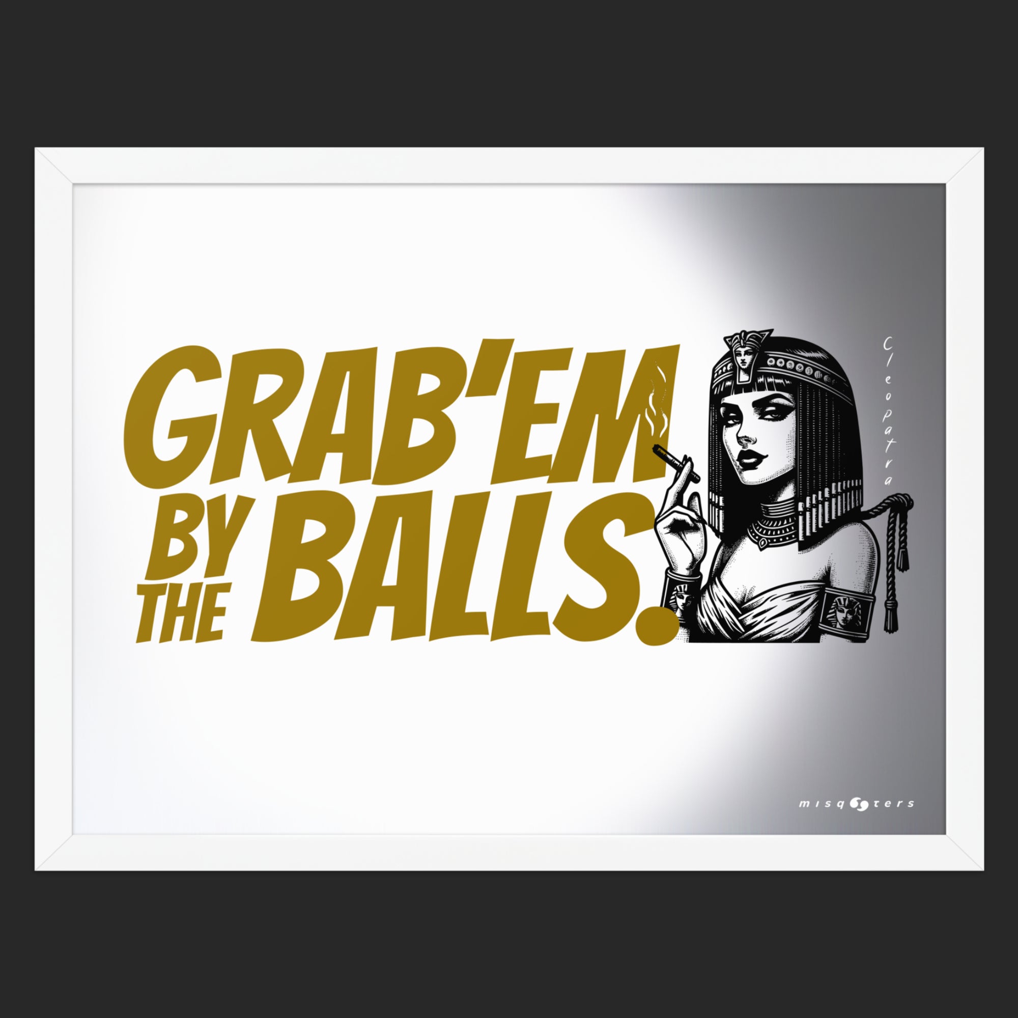 Framed artwork with text 'GRAB'EM BY THE BALLS.' and a stylized illustration of a woman in a headdress.