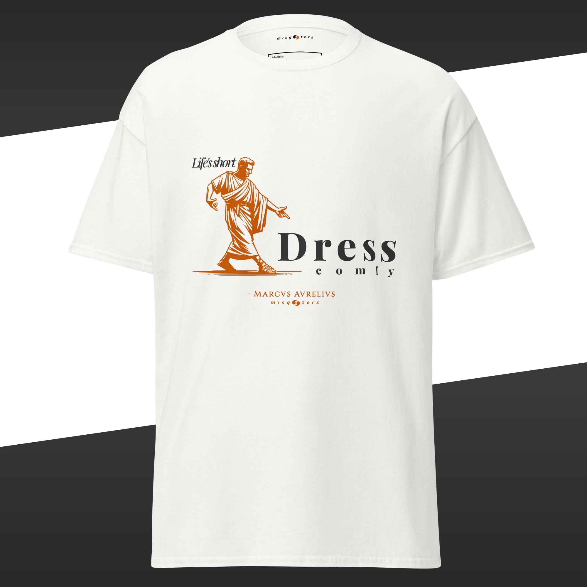 White t-shirt with orange and white graphic design off Marcus Aurelius featuring the fake quote "dress comfy"