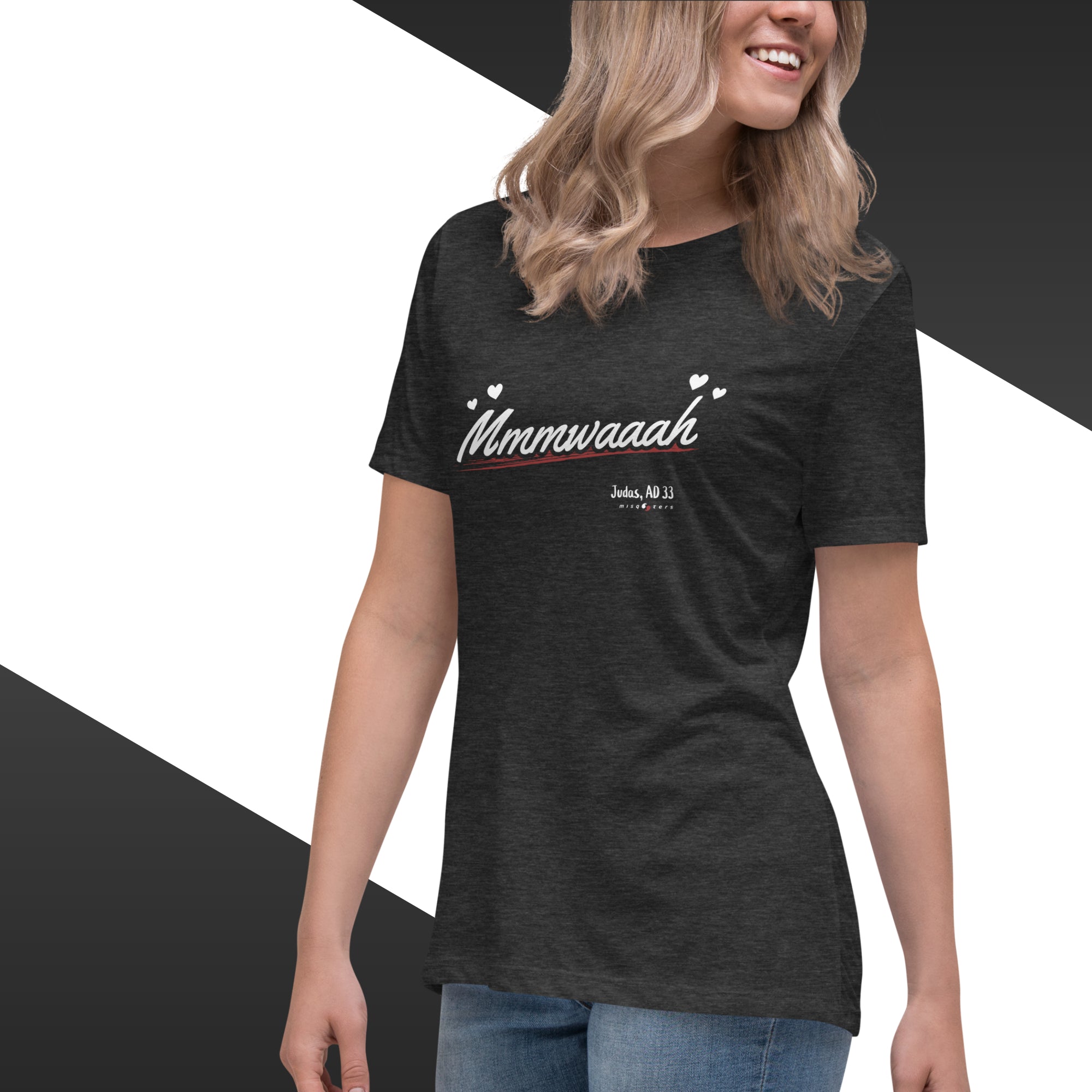 Woman wearing a black t-shirt with 'Mmmwaaah' text design.