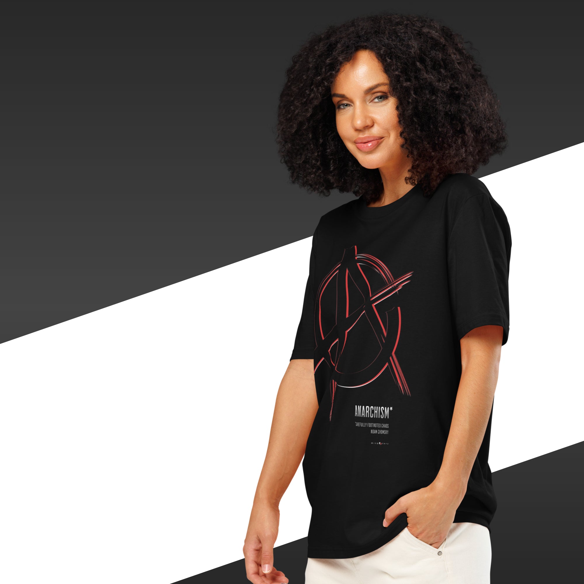 Woman wearing a black t-shirt with a red graphic design on a black and white background