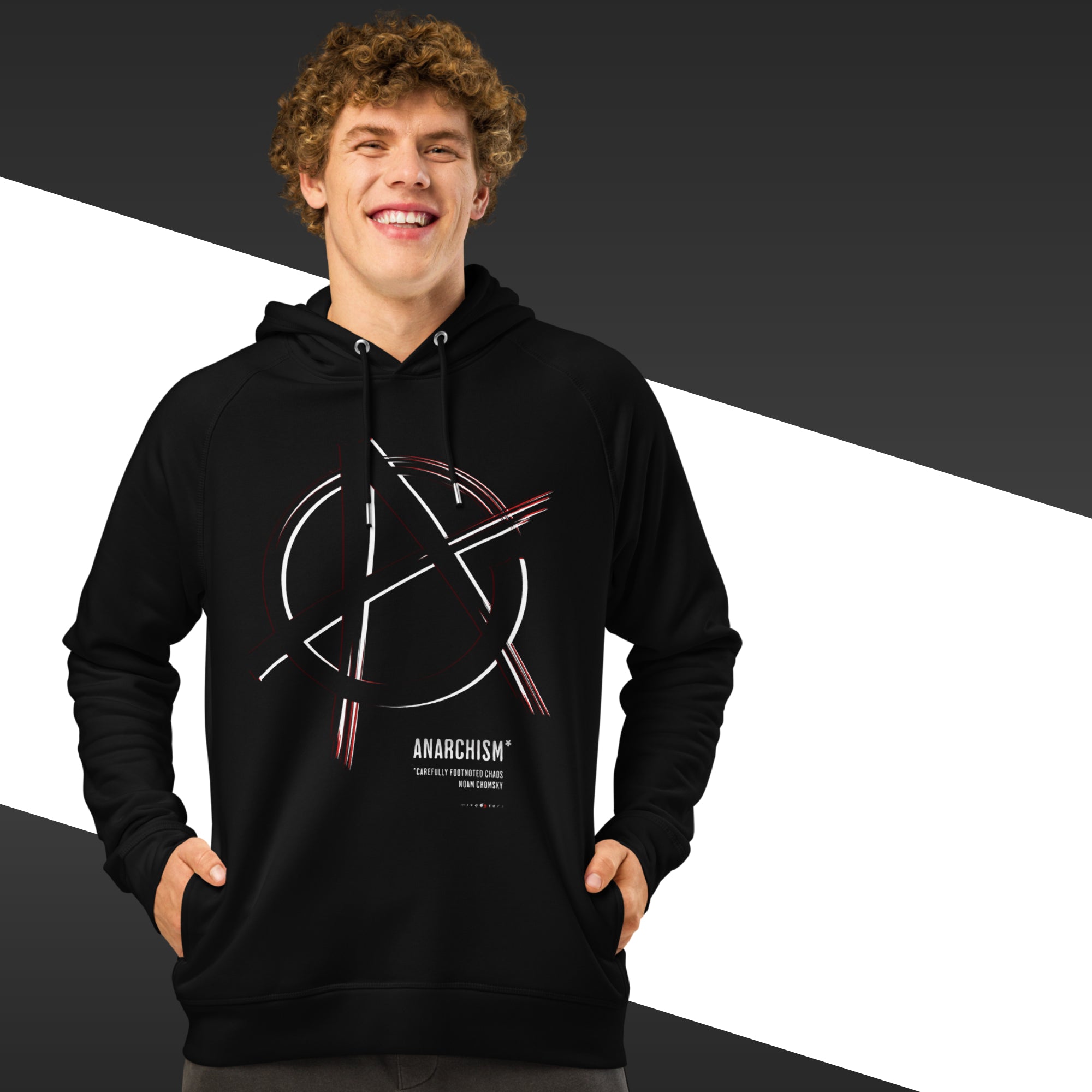 Man wearing a black hoodie with an anarchism symbol design on a black and white background