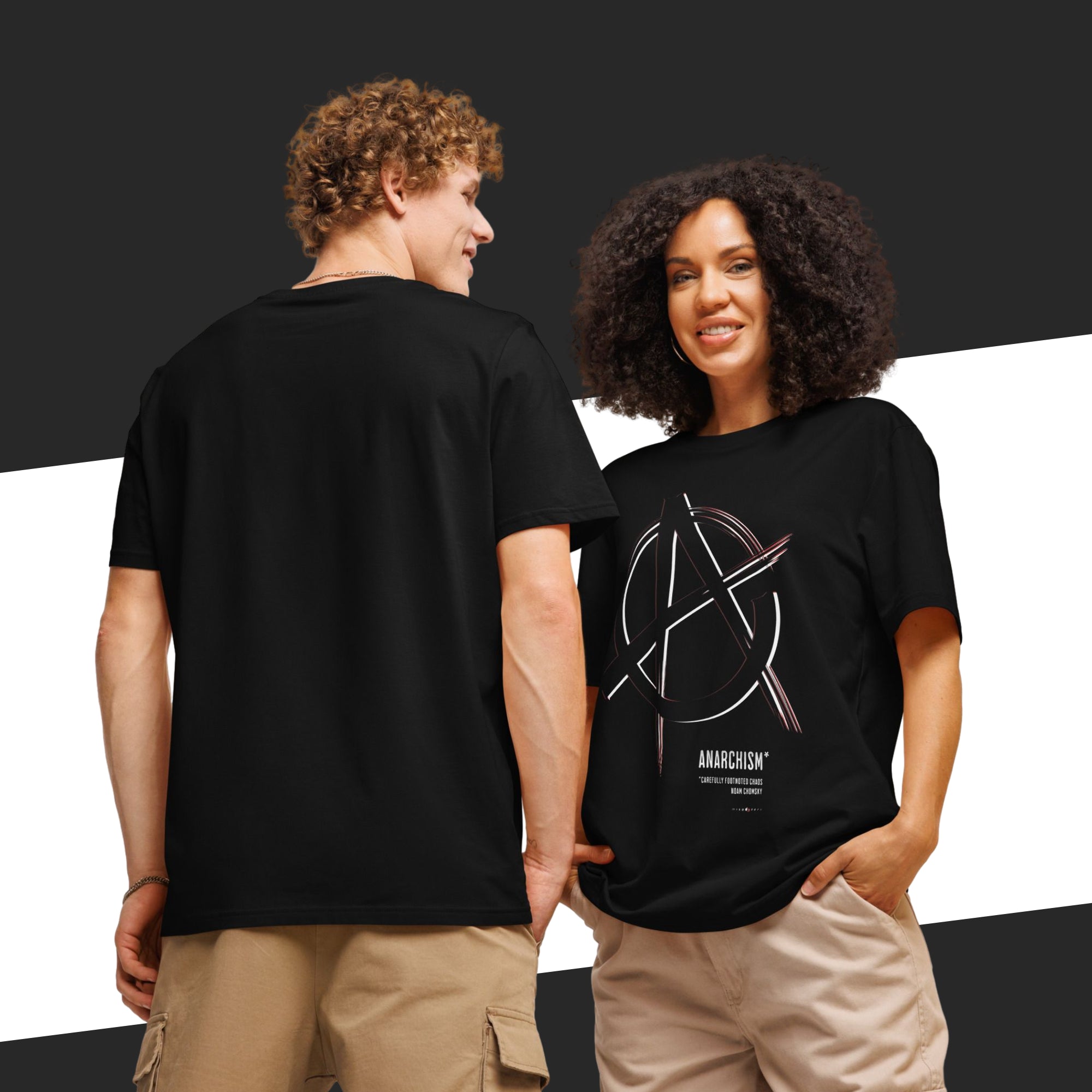 Two people wearing black t-shirts, one plain and one with a design.